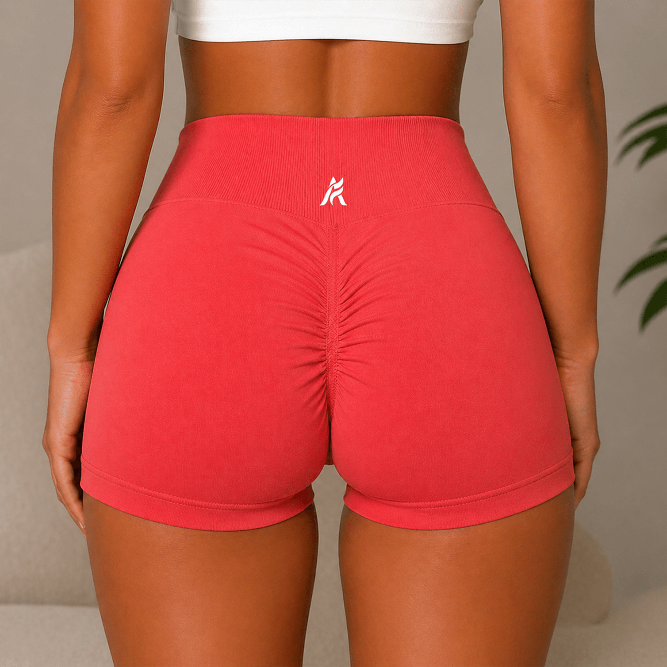 Woman-in-gym-workout-shorts-back-red@2x.png
