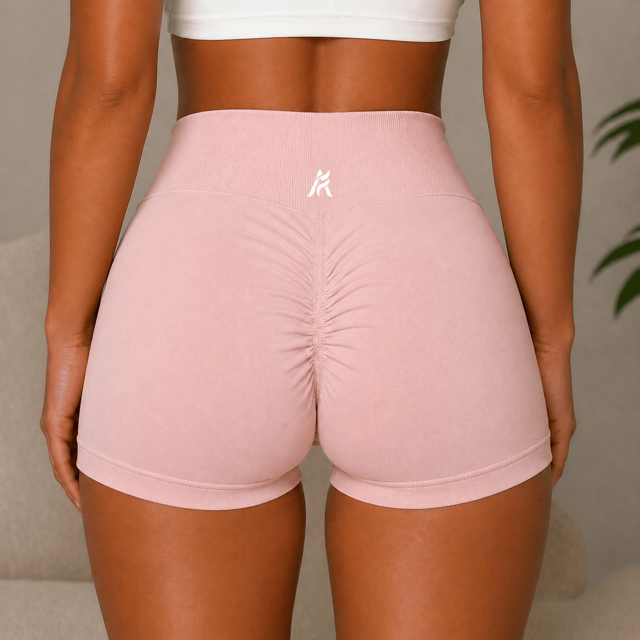 Woman-in-workout-shorts-back-rosa.png