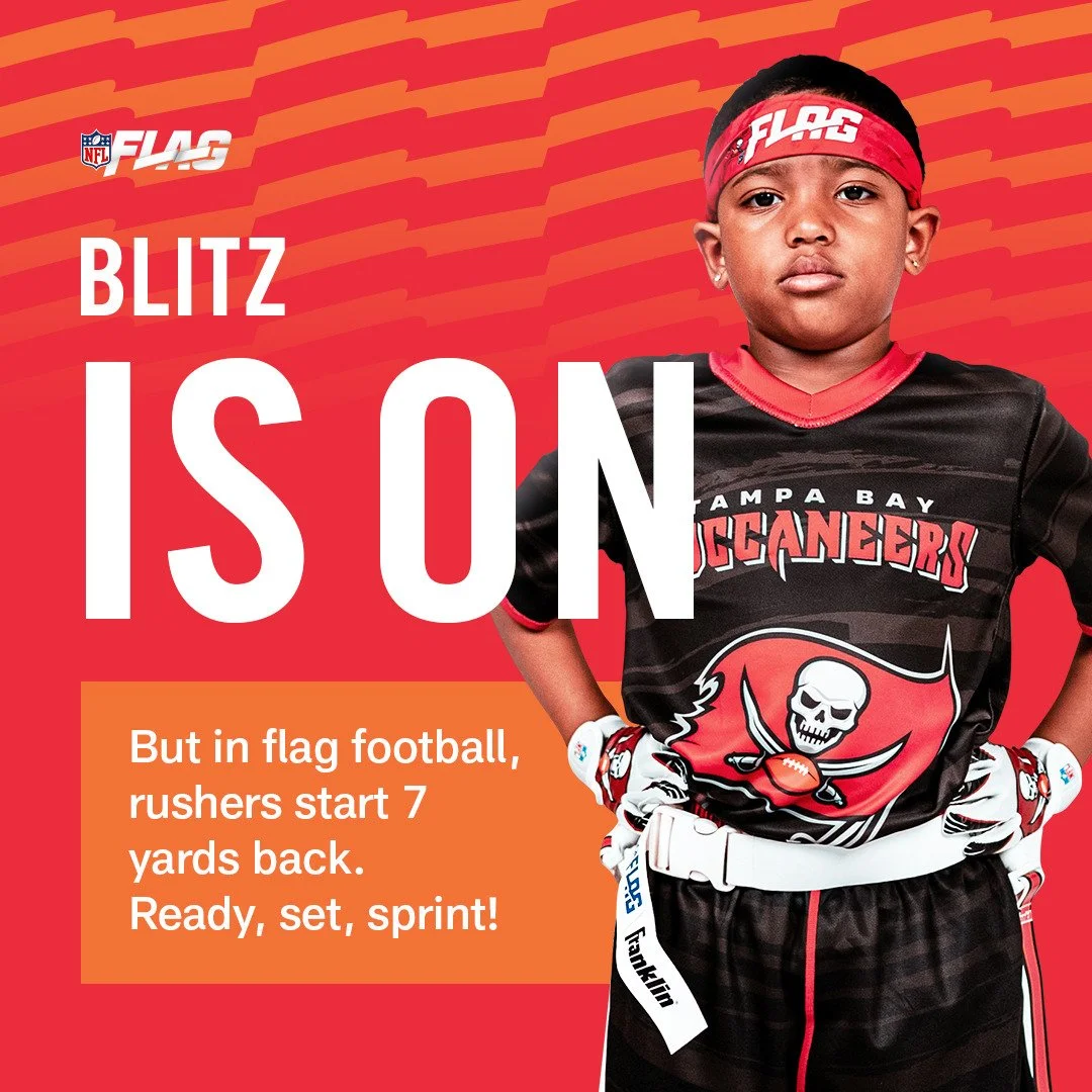 Young boy in Tampa Bay Buccaneers football gear, wearing a black jersey with a skull and swords logo, a red headband, and white gloves, standing with hands on hips against a red background with orange text.