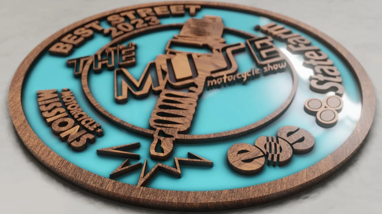 Rendering of competition coin for The Muse Motorcycle Show - Motorcycle Missions - EOS North America - State Farm Insurance
