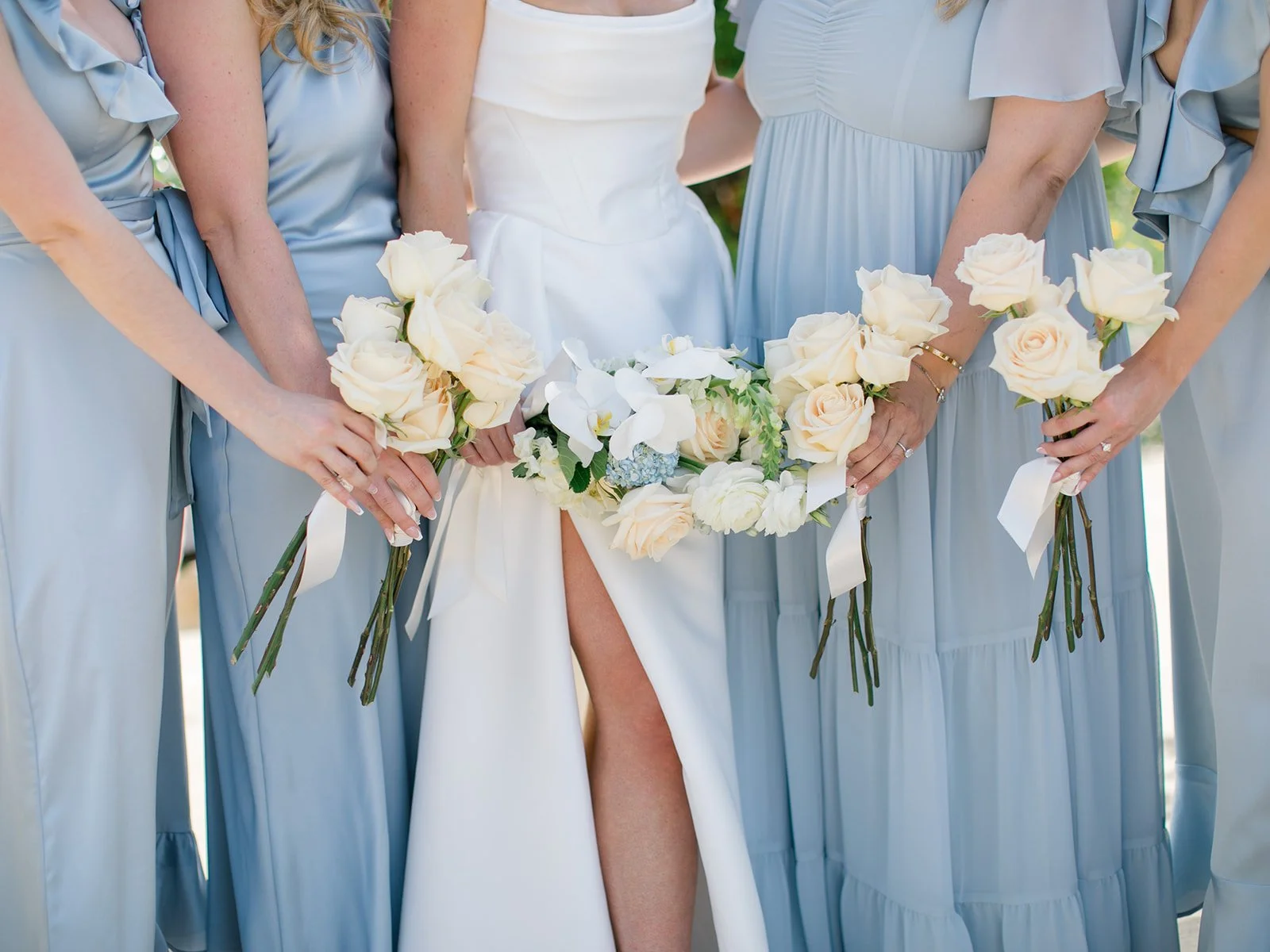Dusty Blue Dresses with Simple Bouquets.JPG