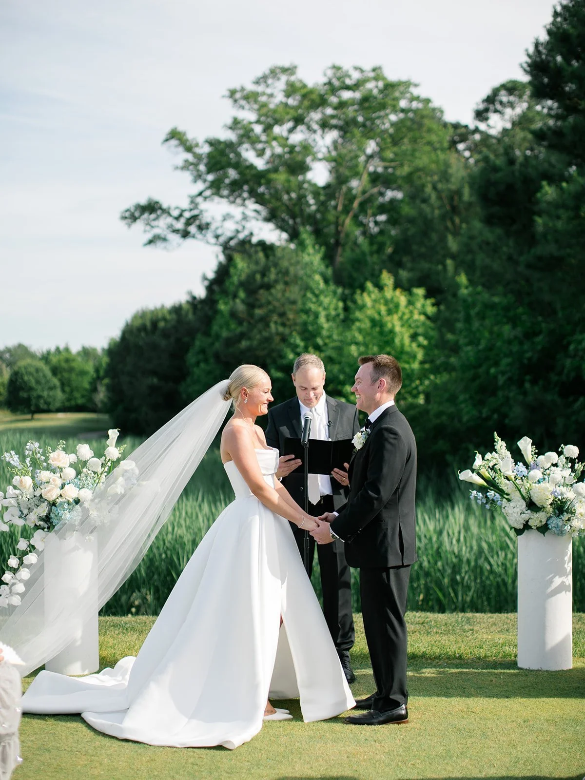Ceremony with Pillars and Florals.JPG