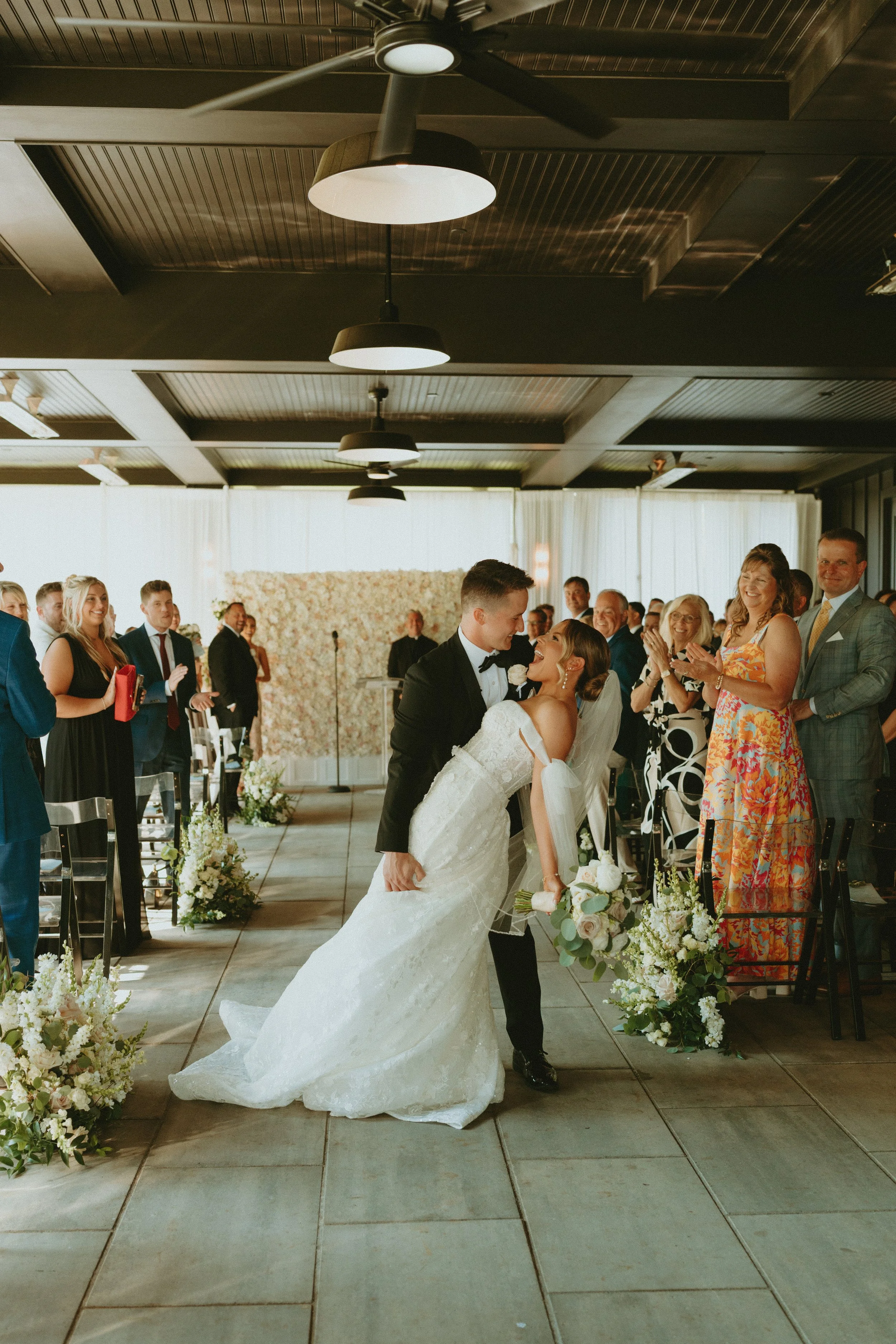 Wedding Couple Ceremony Aisle Kiss.jpg