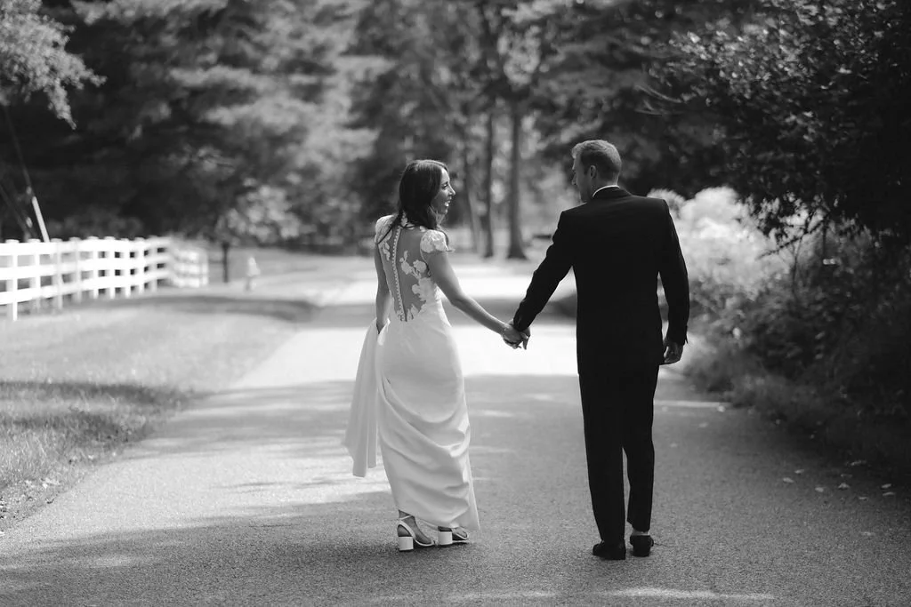 Black and White Photos of Bride and Groom in Tux.jpg