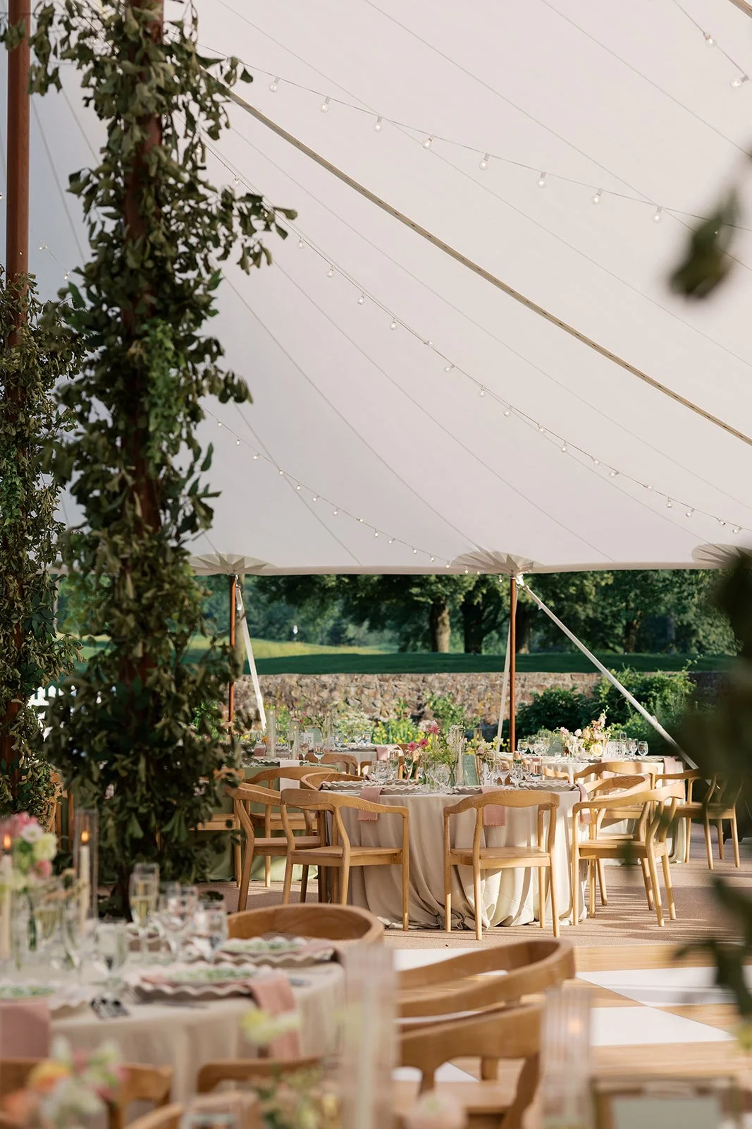 Greenery Tented Poles with Florals.jpg