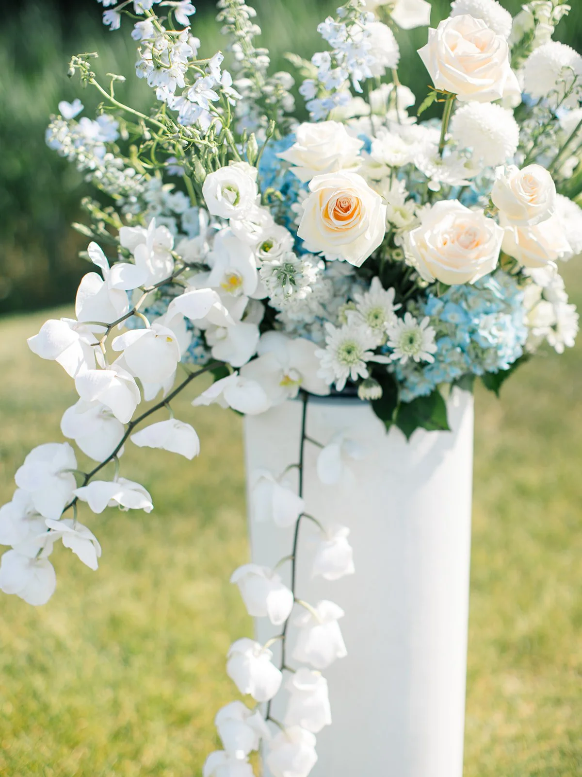 Aisle Capped Wedding Ceremony with Floral Pillars.jpg