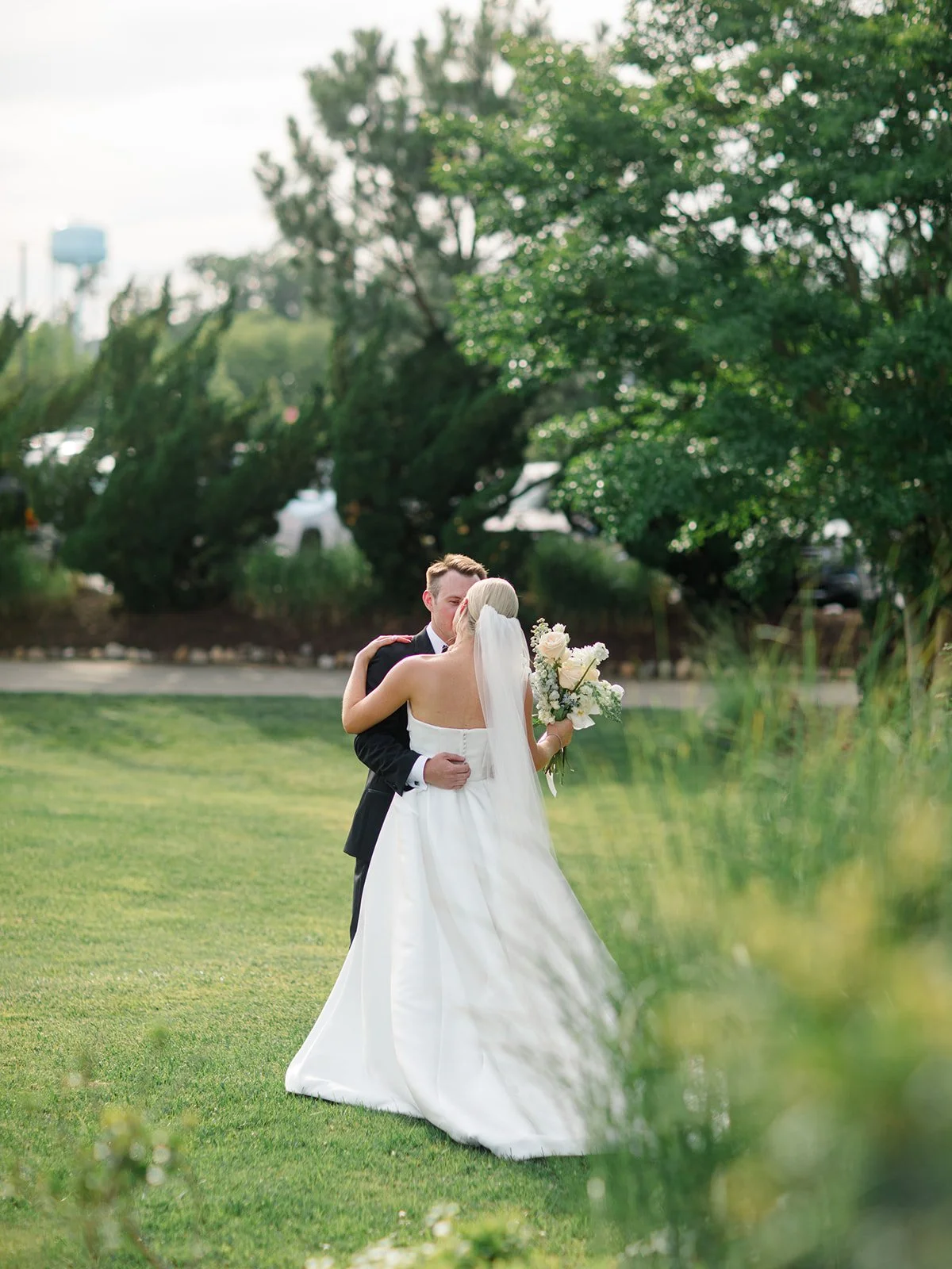 First Look Moment with Bride and Groom on the First Tee.jpg
