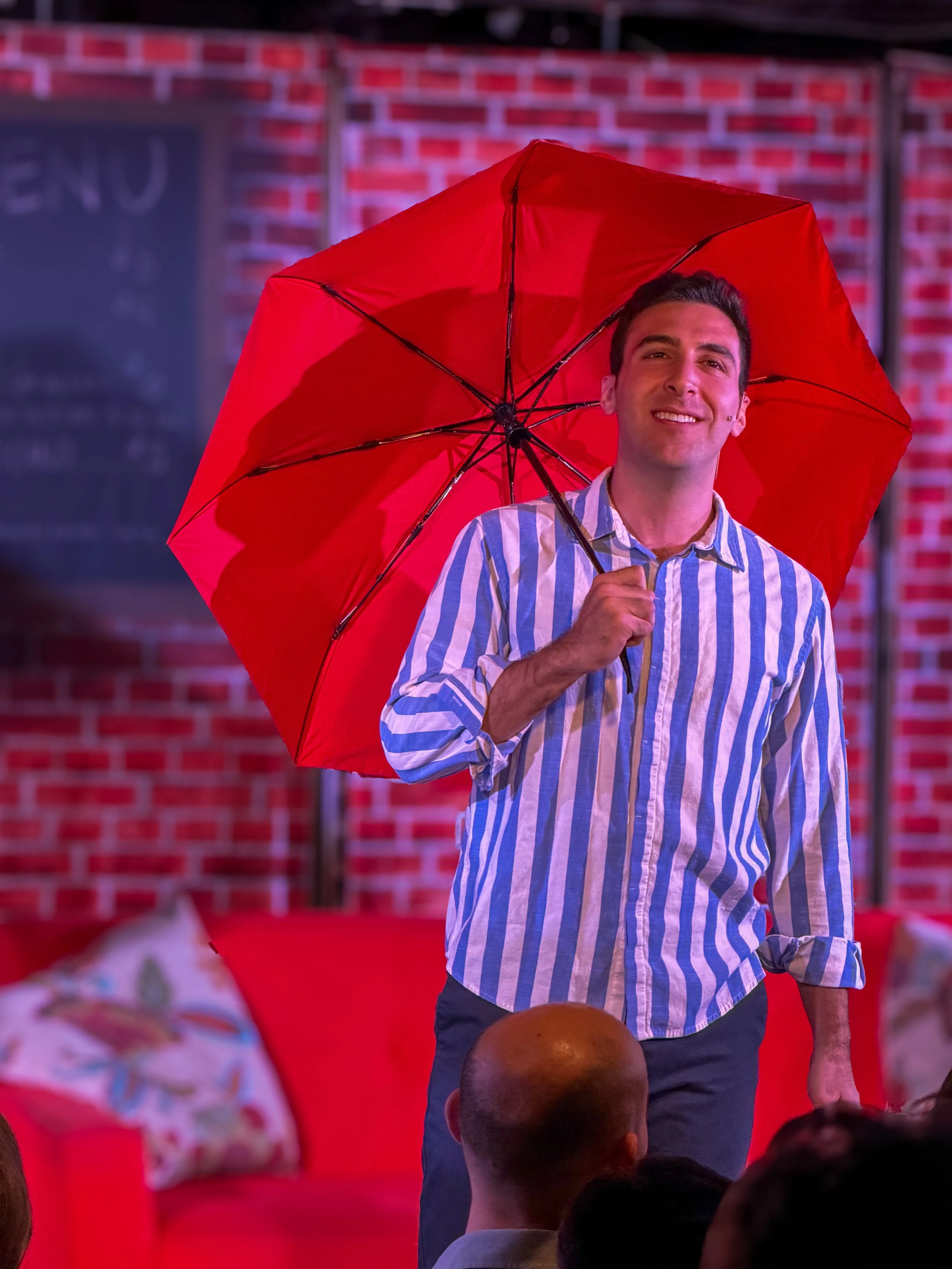 Jake Latts performing in Friends! The Musical Parody