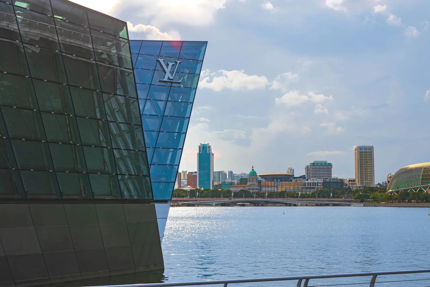 Glass architecture overlooking the waterfront and skyline
