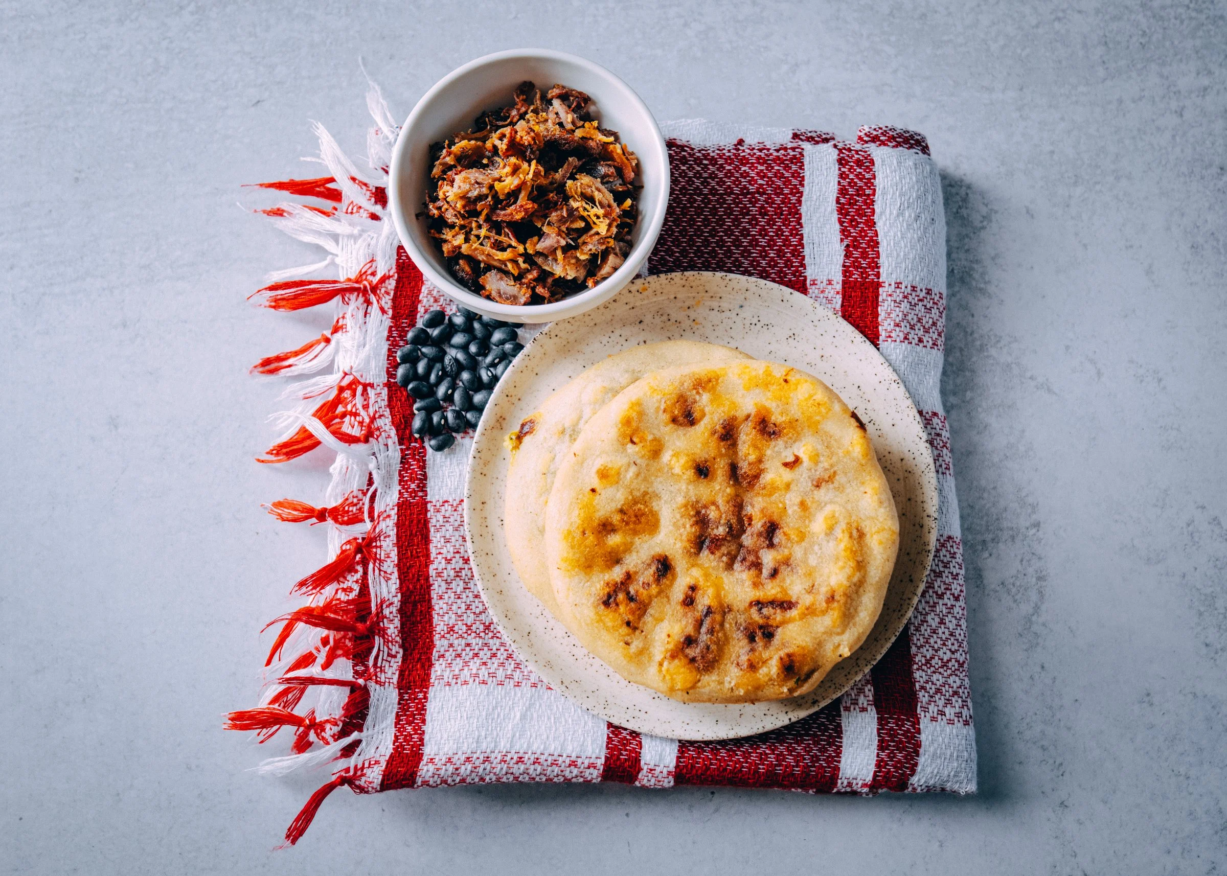 Revueltas (chicharrón, black beans & cheese)