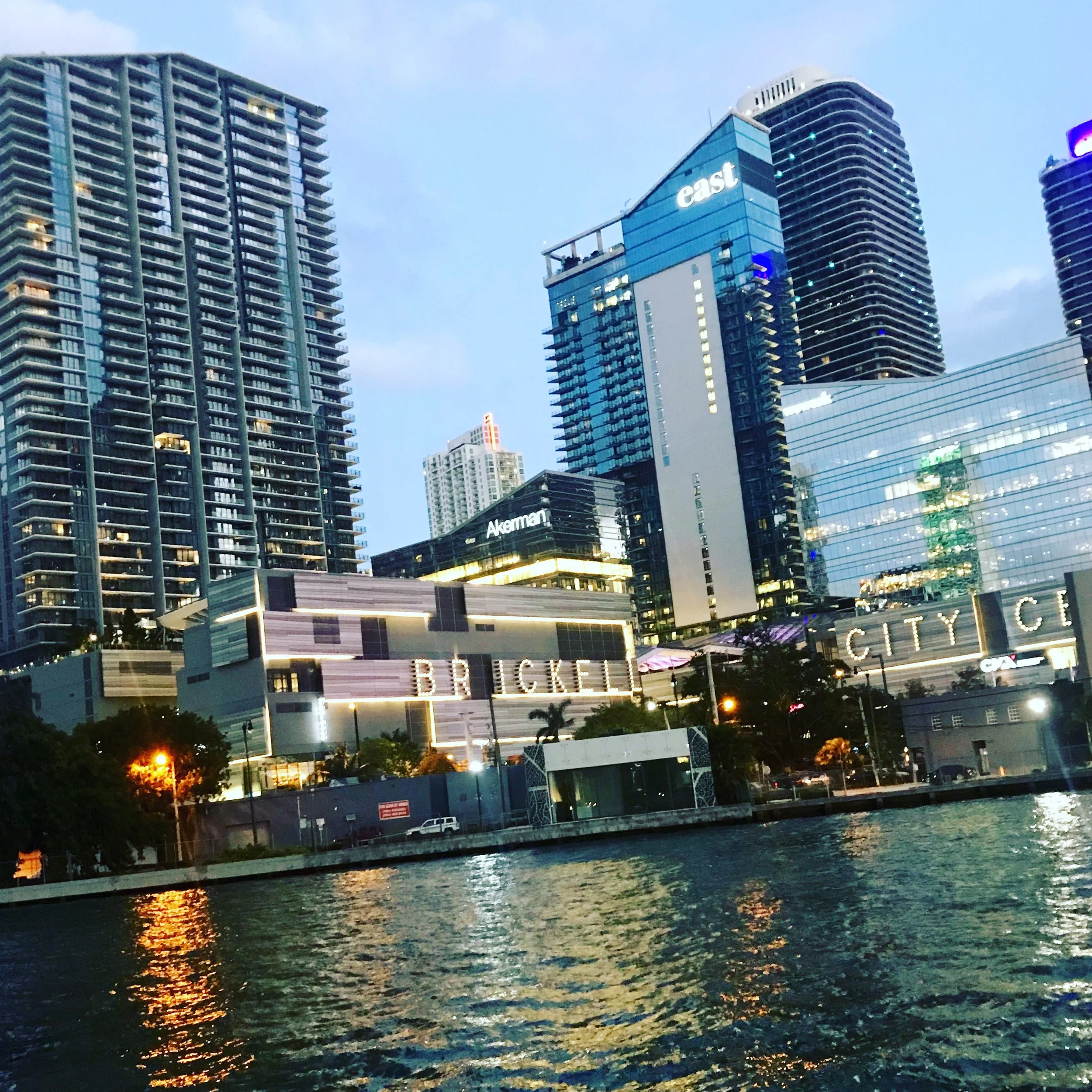 I like how the water diluted the city lights. 
[Brickell, Miami].