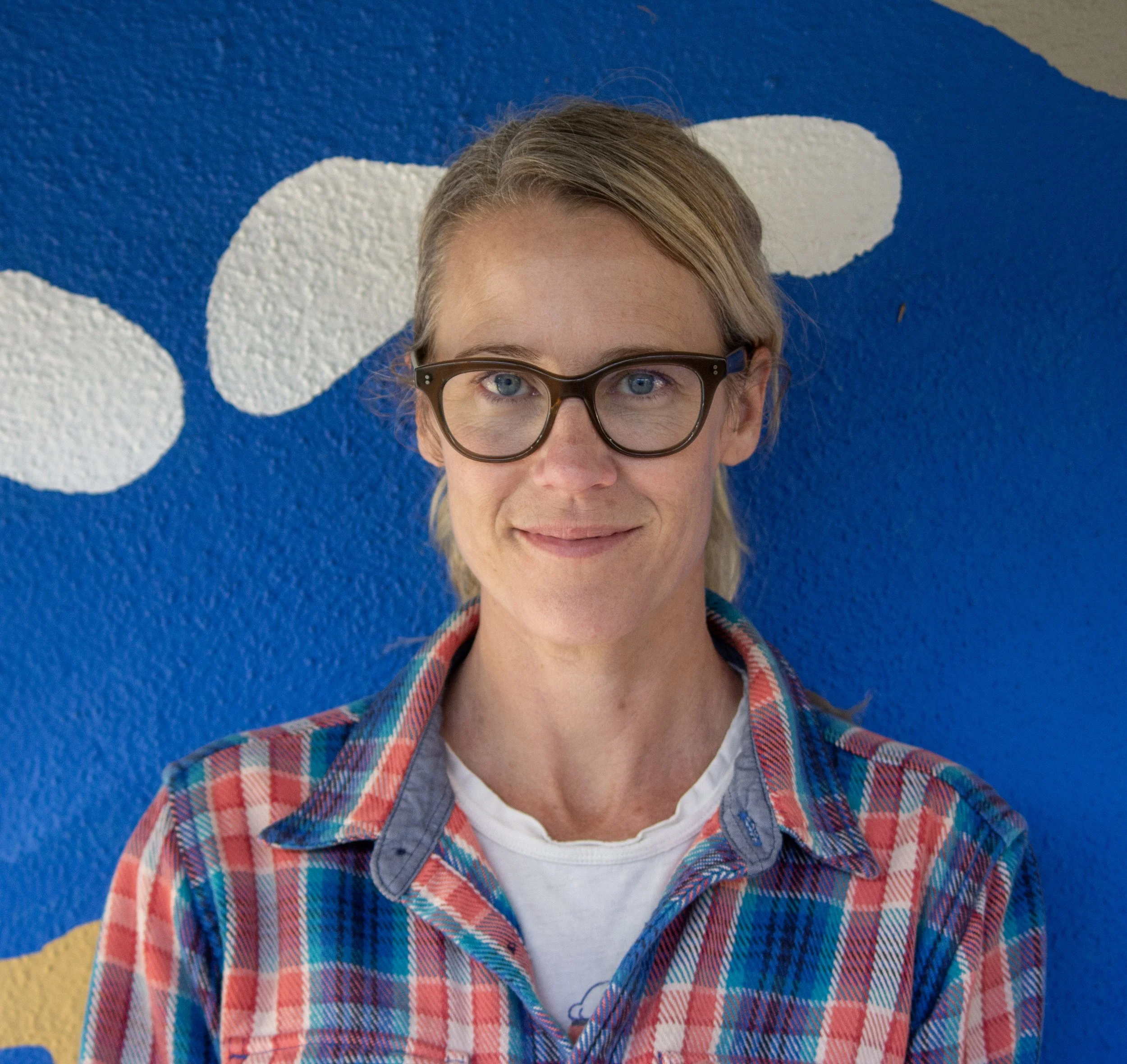 A heart outline with a sun and an owl inside, and text that reads 'alta DENA ODYSSEY always' on a banner.