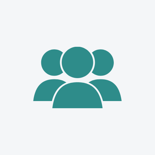 Icon of a group of four people representing a team or community.