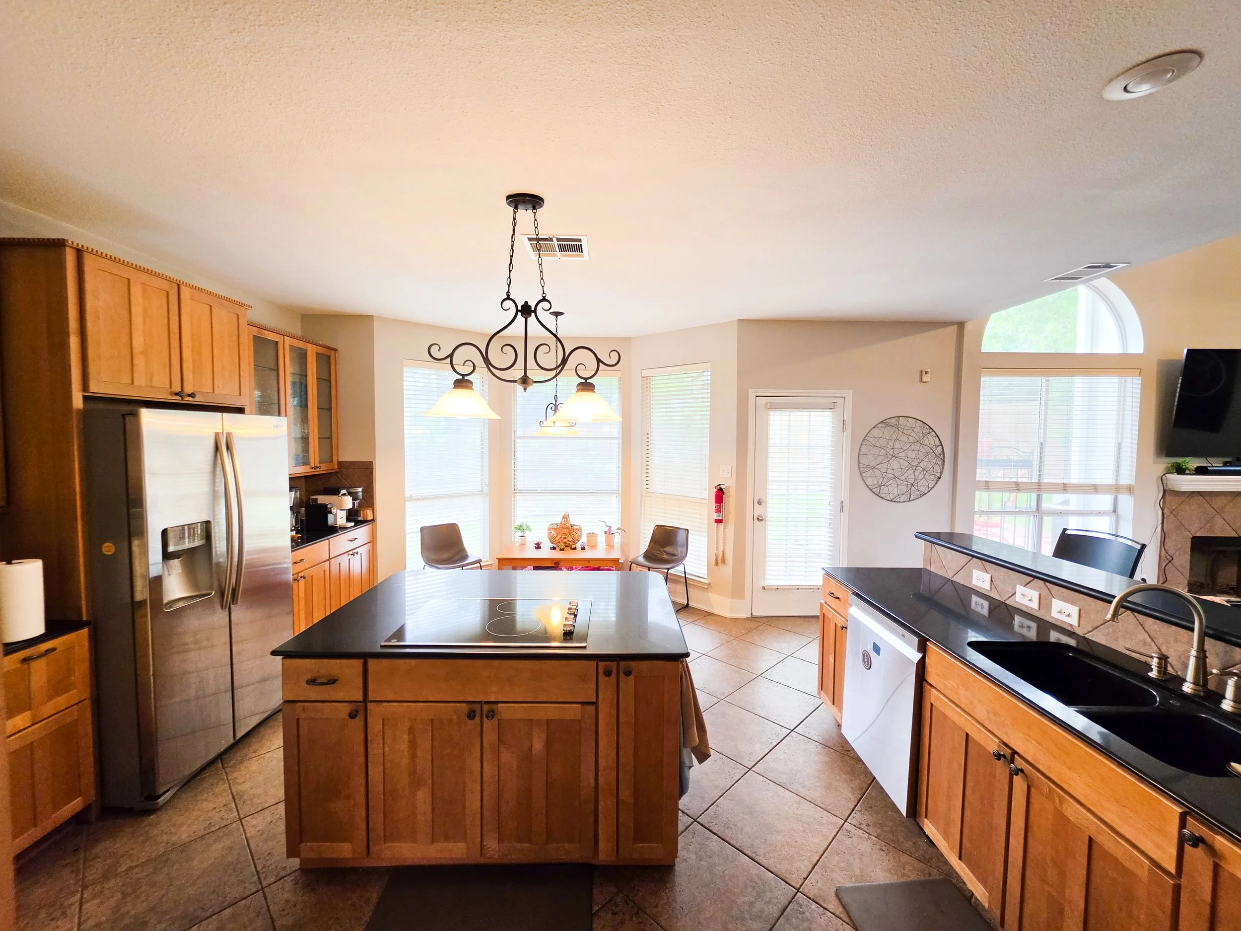 Our kitchen is bright and airy at Fireside. Fireside Sober Living offers alternative, non-AA, non-traditional, AA, and traditional program modalities.