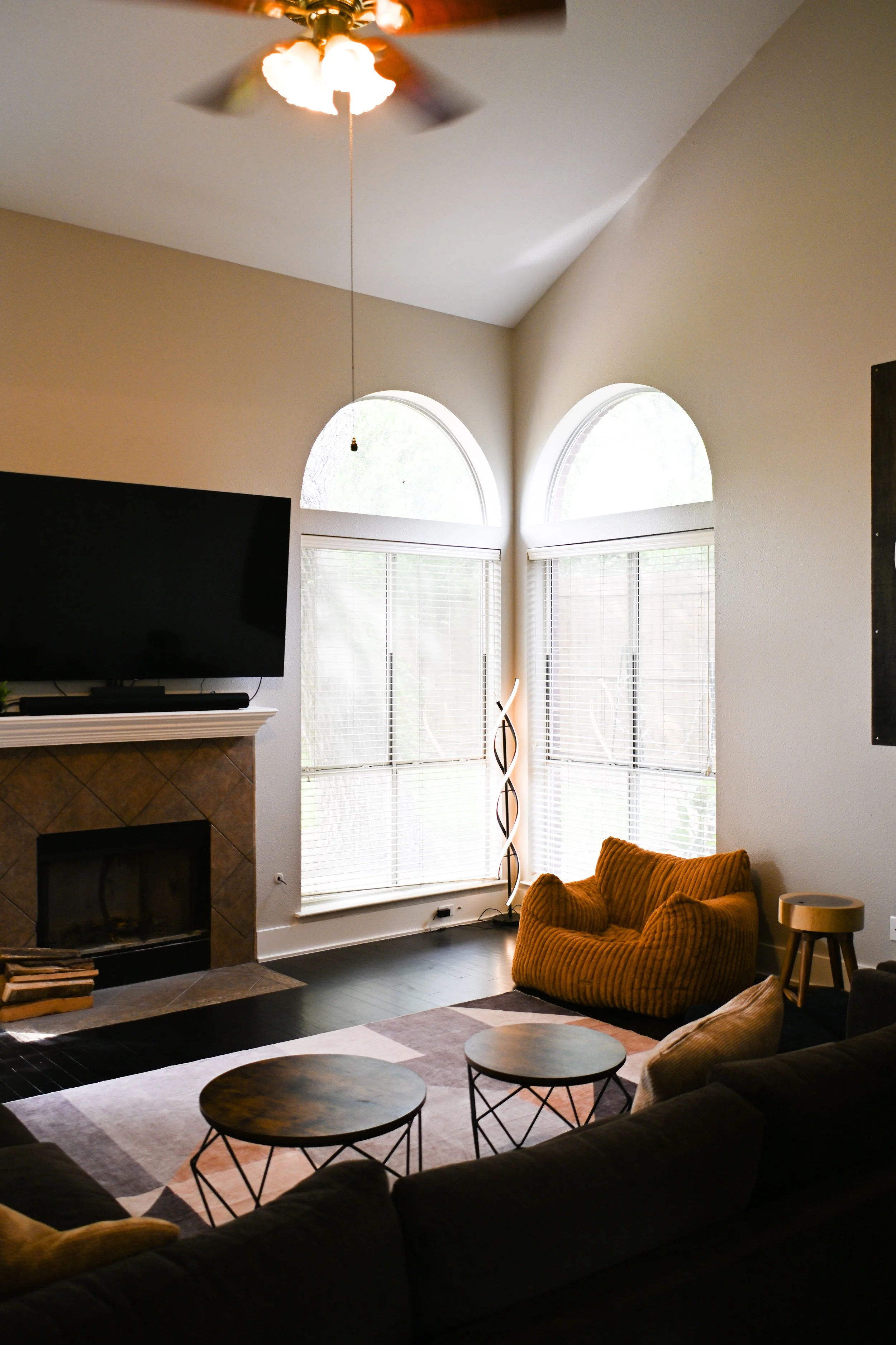 Living room from another angle, showing plenty of natural light at Fireside Sober Living.