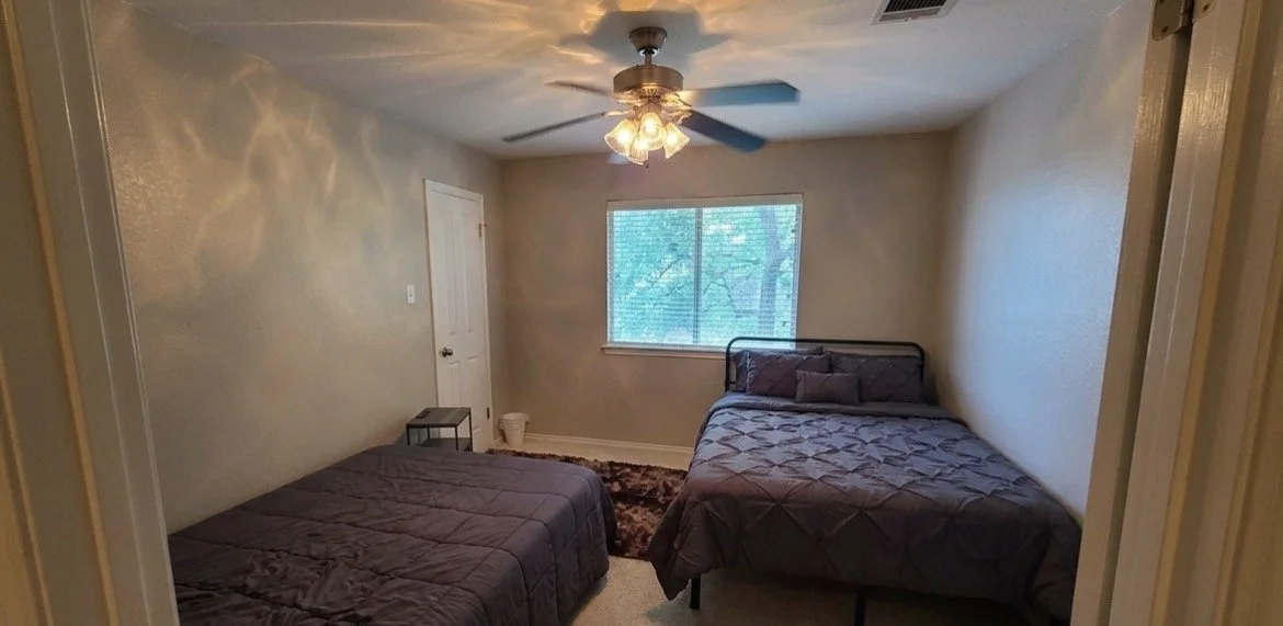 Fireside Sober Living bedroom with two beds.