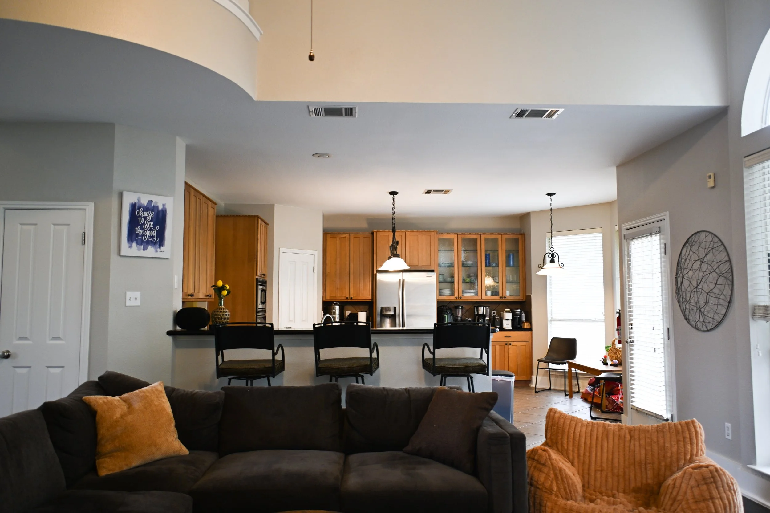 Open-concept living room with our kitchen in the back. Fireside Sober Living offers alternative, non-AA, non-traditional, AA, and traditional program modalities.