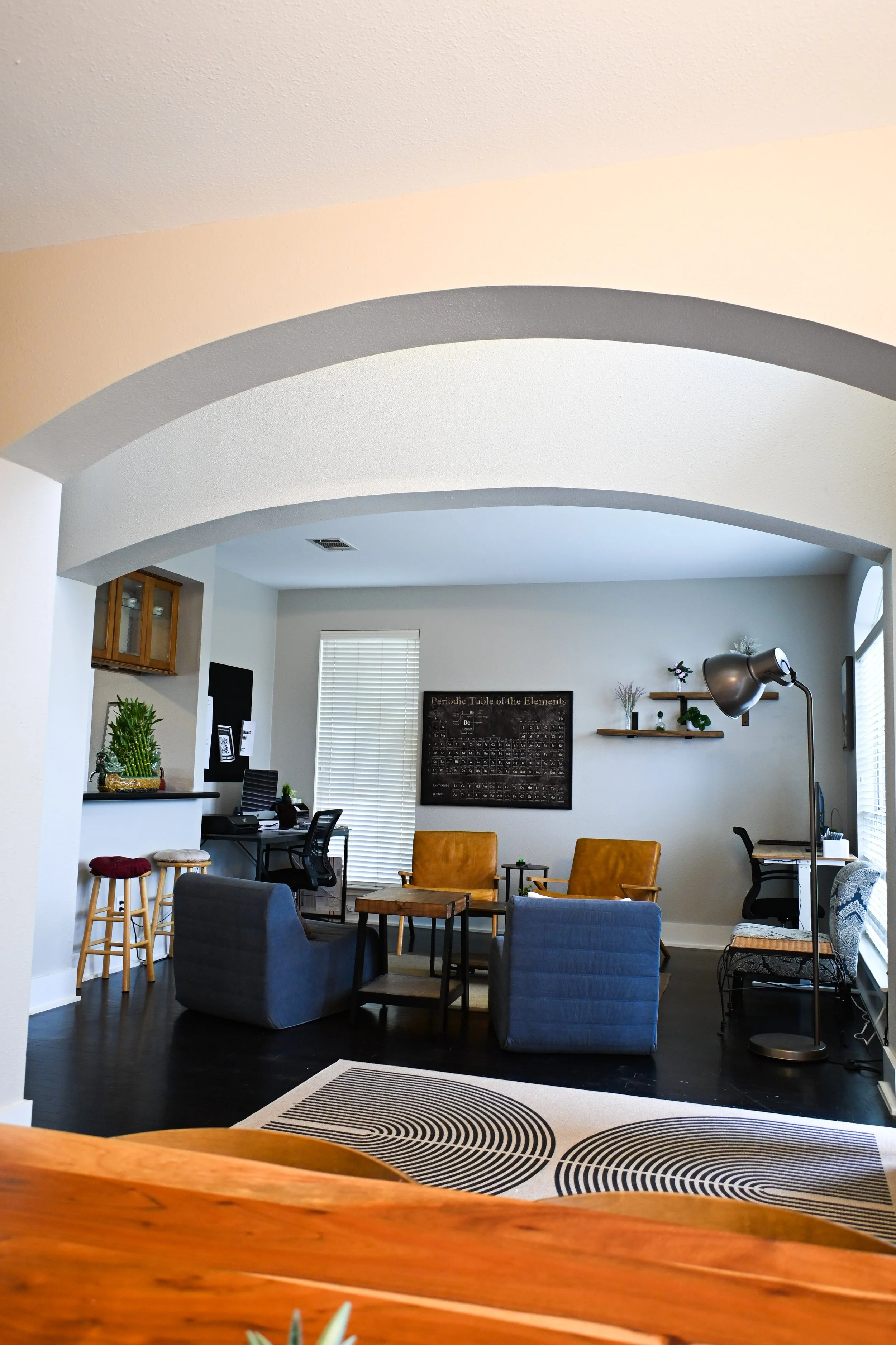 A modern office area and sitting room at Fireside sober living - holistic wellness in Austin, Texas.