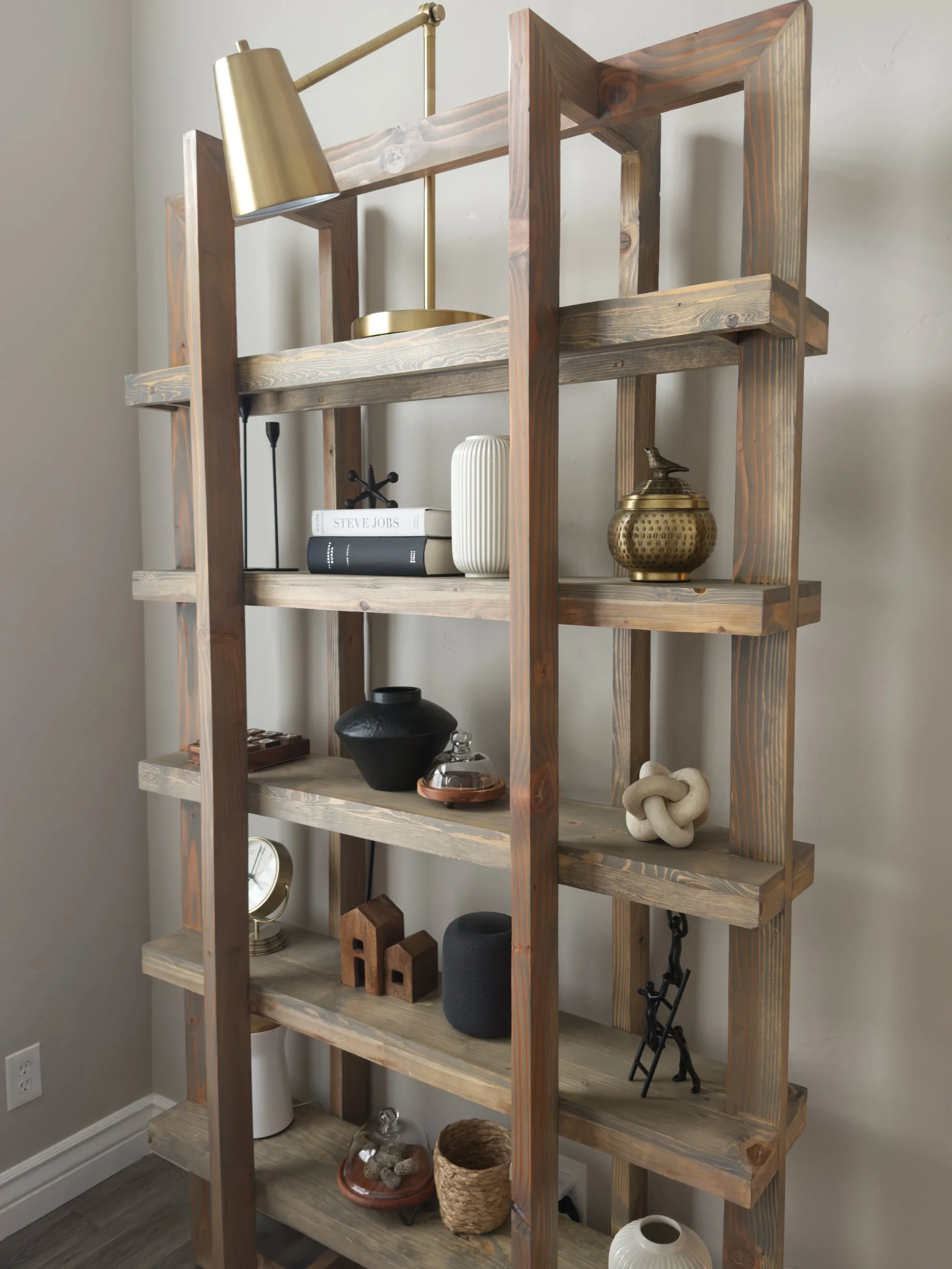 Custom decorated bookcase in Salt Lake City, UT. Reclamation Home offers affordable custom decorating  and design services in Davis County, Weber County, and Salt Lake County.