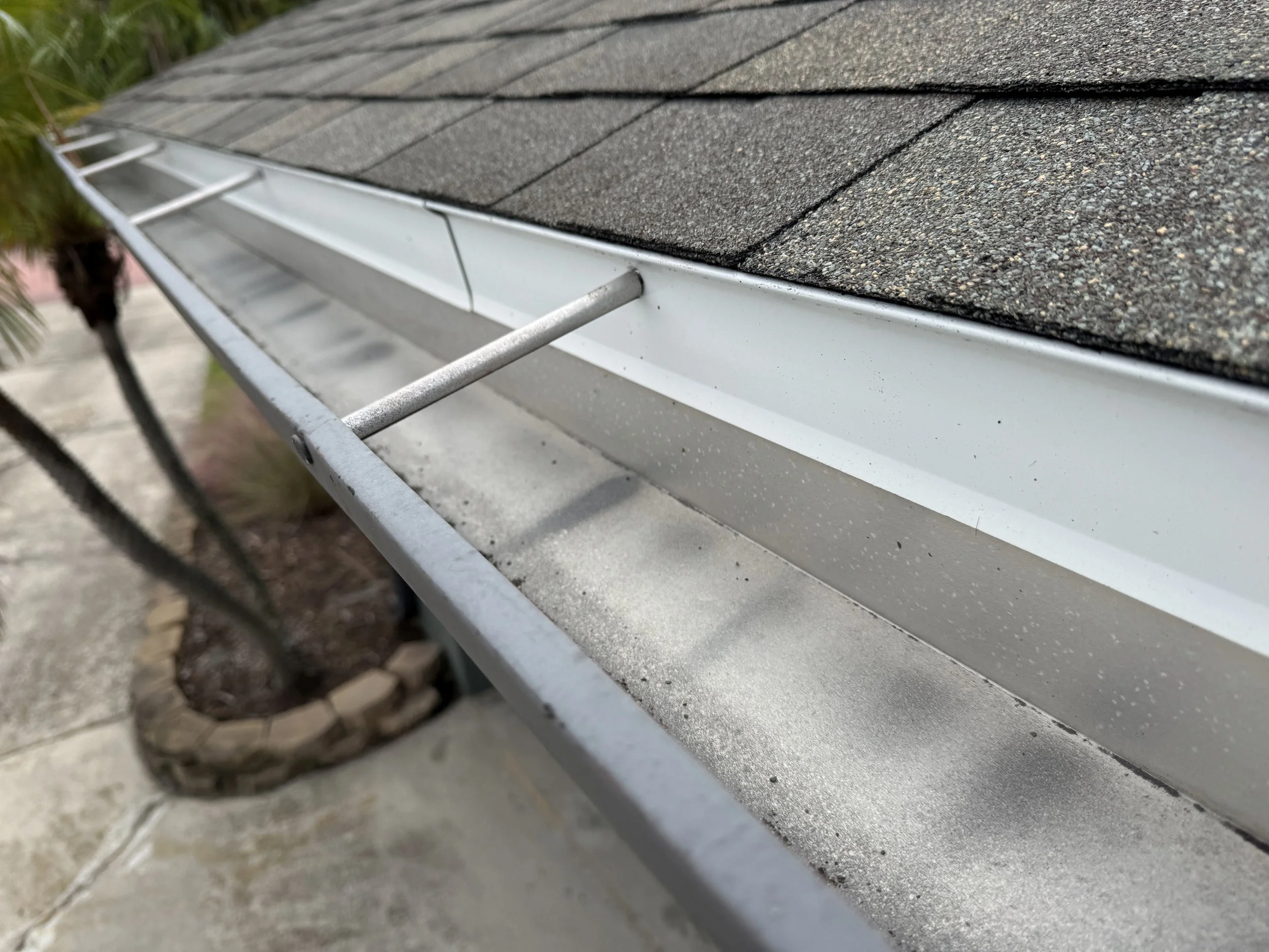 Drip edge and gutter along the eave.JPG