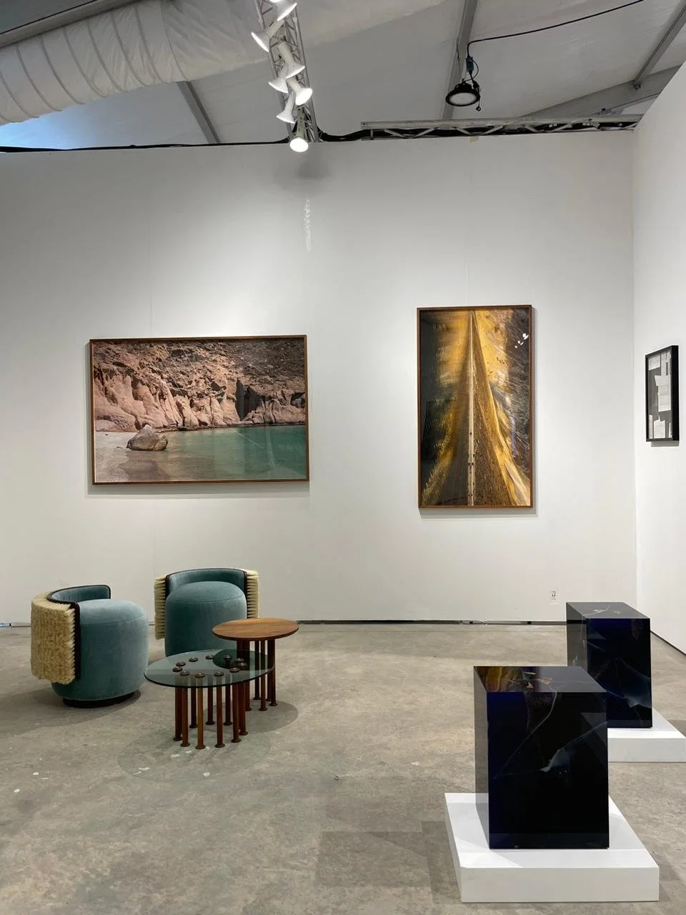 Courtesy of ammann//gallery - Booth view at Art Miami 2022. Photographic pieces on wall (left to right) Isla Partida, 165x110cm.  Espejo 83x150cm. Giclée print on cotton paper intervened with golden embroidery.