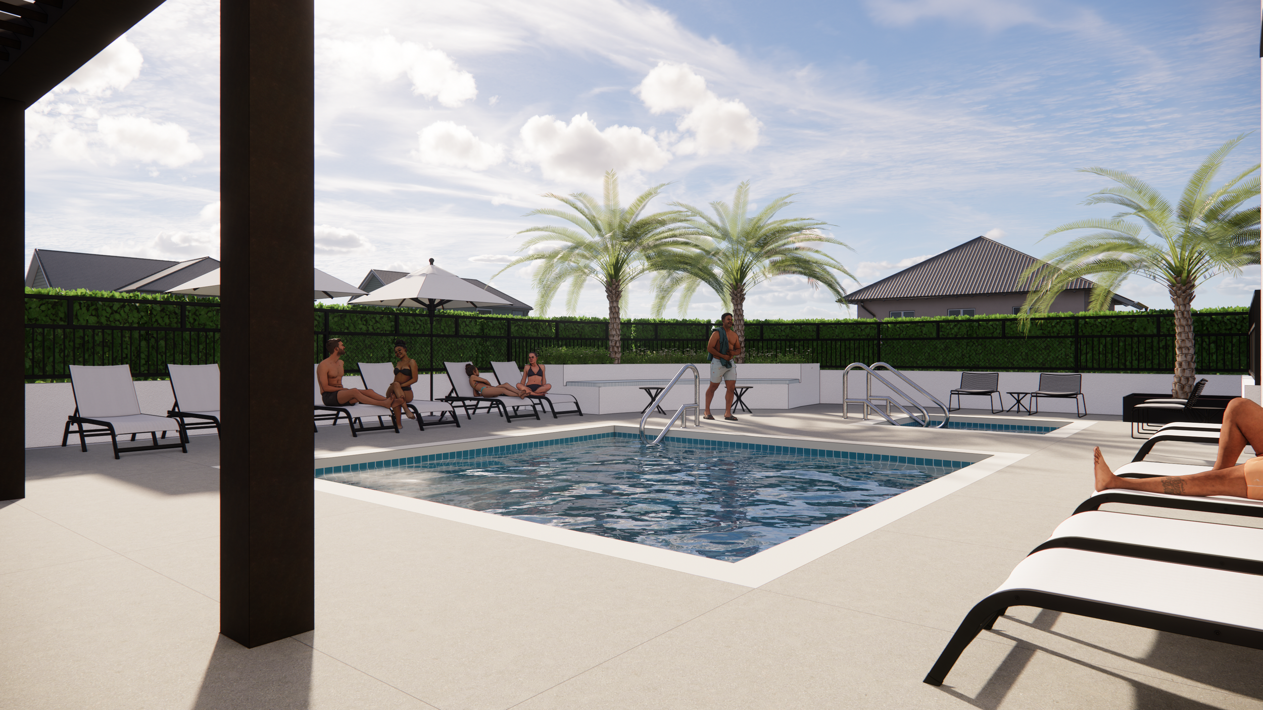A swimming pool area with lounge chairs, umbrellas, and palm trees under a partly cloudy sky. People are relaxing and a person is walking by the pool.