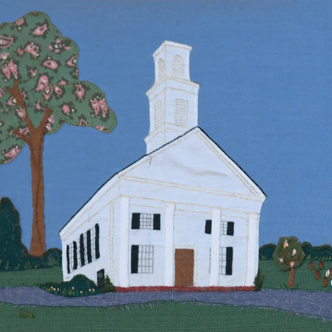 Painting of a white church with black windows and a steeple, set against a blue sky with trees on either side.