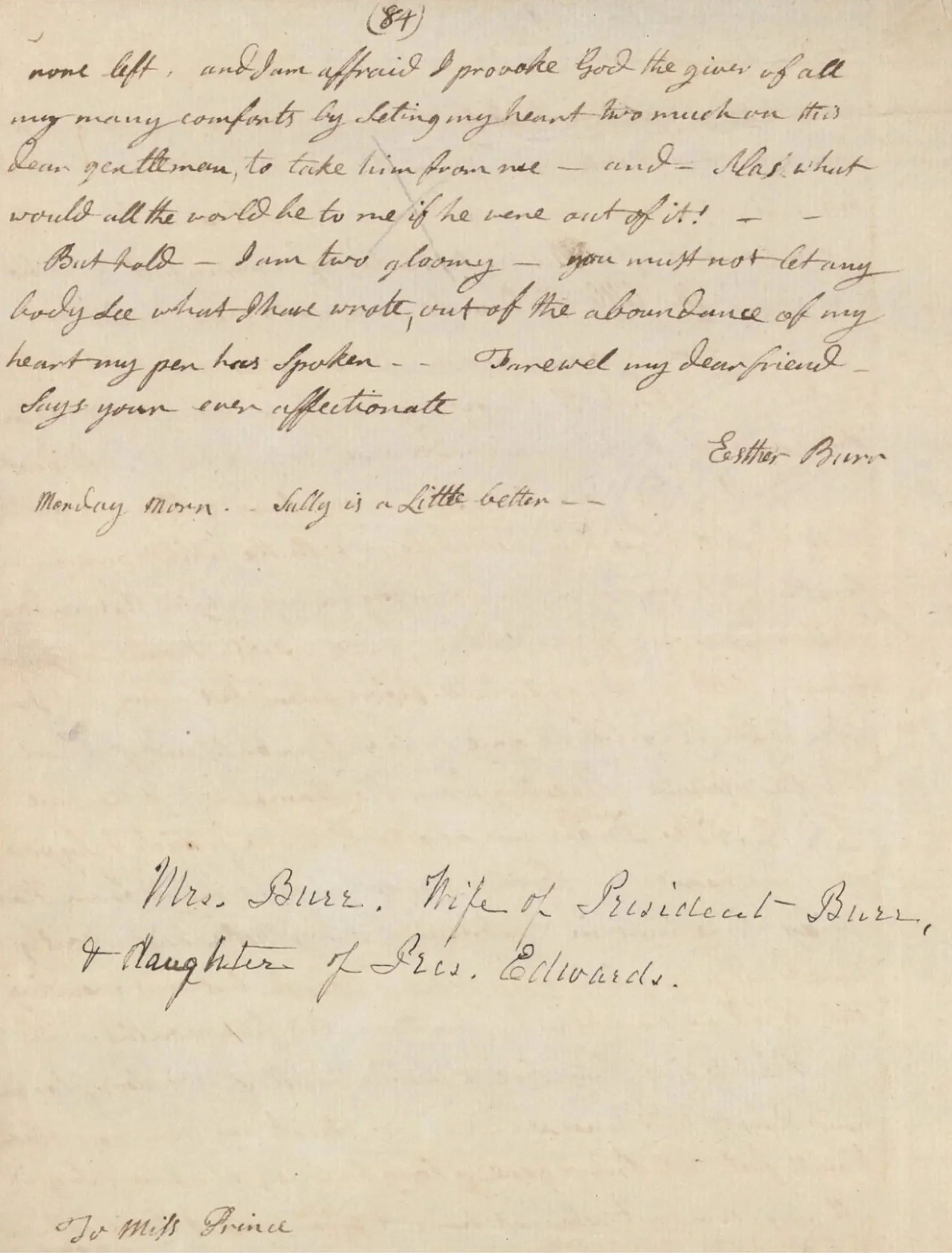 Close-up of handwritten letter on aged paper, showing cursive writing and partial signatures.