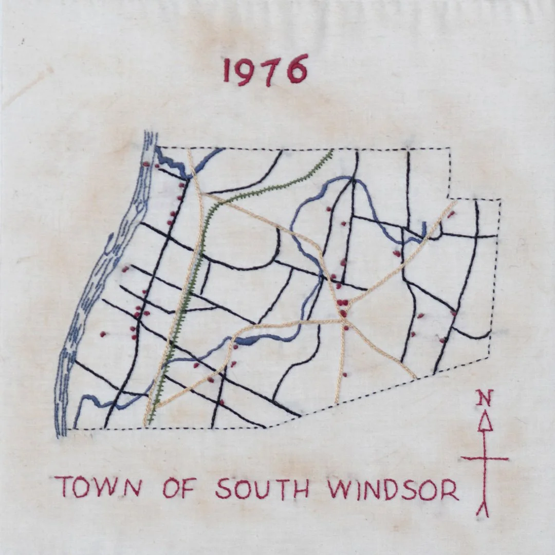 Embroidery map of the Town of South Windsor from 1976, showing roads, rivers, and boundaries with north arrow.