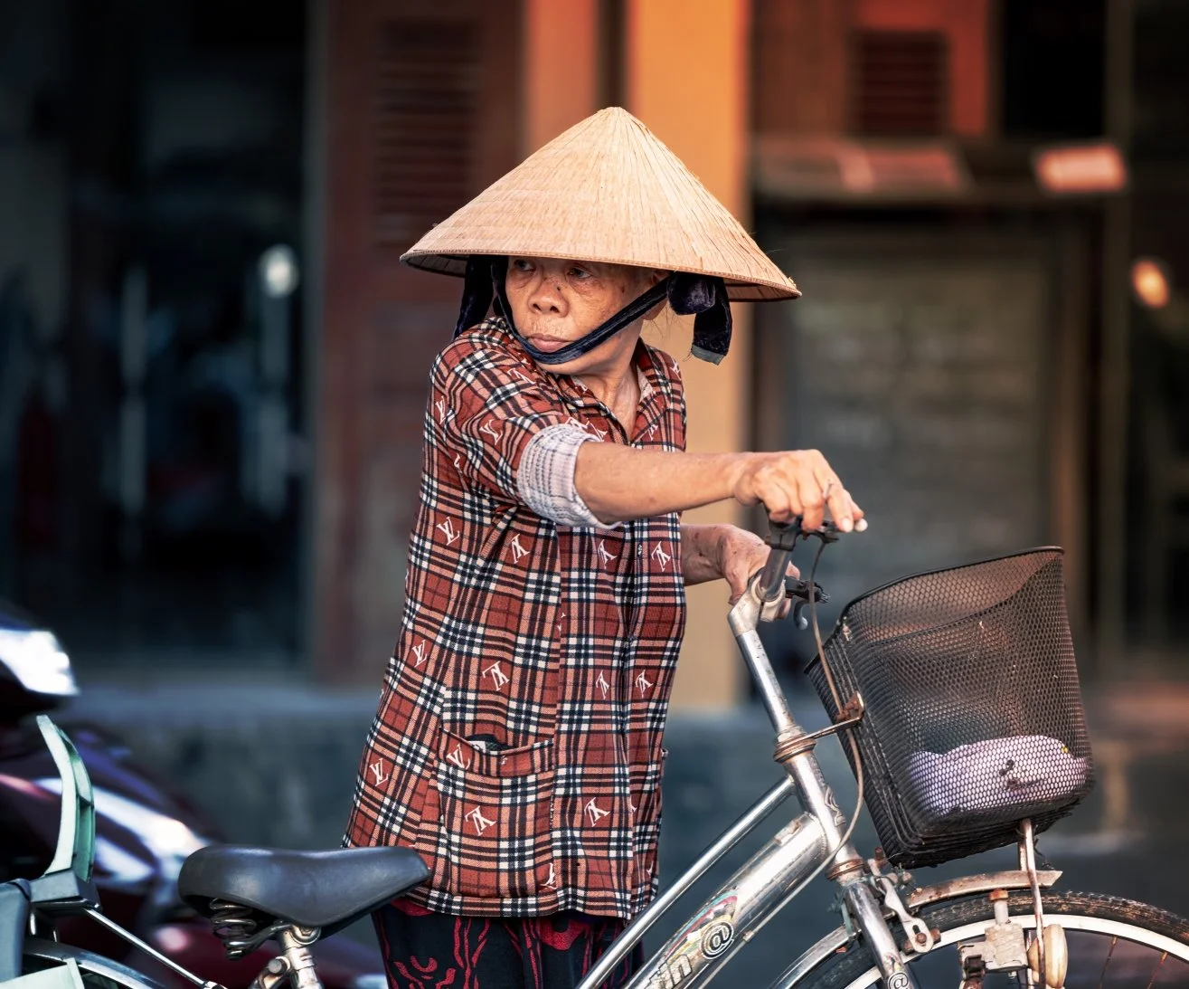 viet woman on bike with cigarette.jpg
