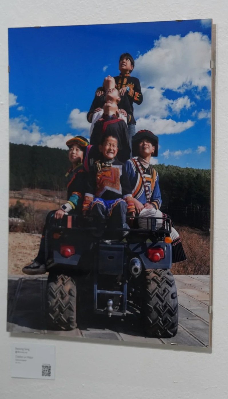 "Children on Motor" By BAOLONG SONG