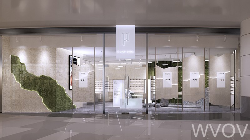 Storefront with glass windows displaying glasses and sunglasses, modern interior design, and a sign with a logo above the entrance.