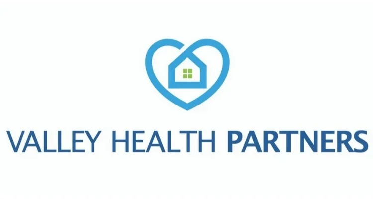 Valley Health Partners logo featuring a heart shape with a house inside, and the text Valley Health Partners