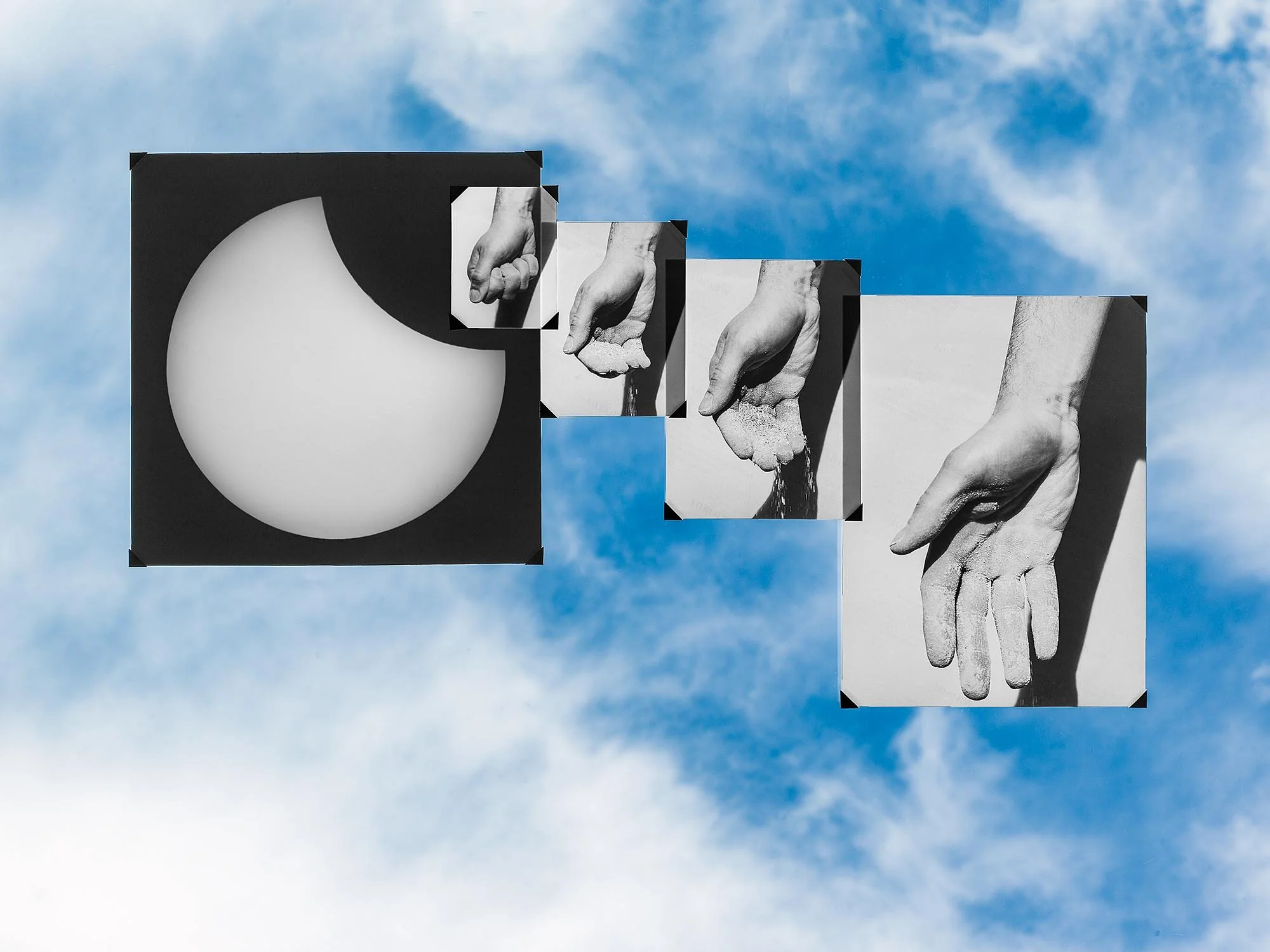 Black and white abstract artwork featuring a large circle and multiple rectangular panels with images of hands in different positions, set against a blue sky with white clouds.