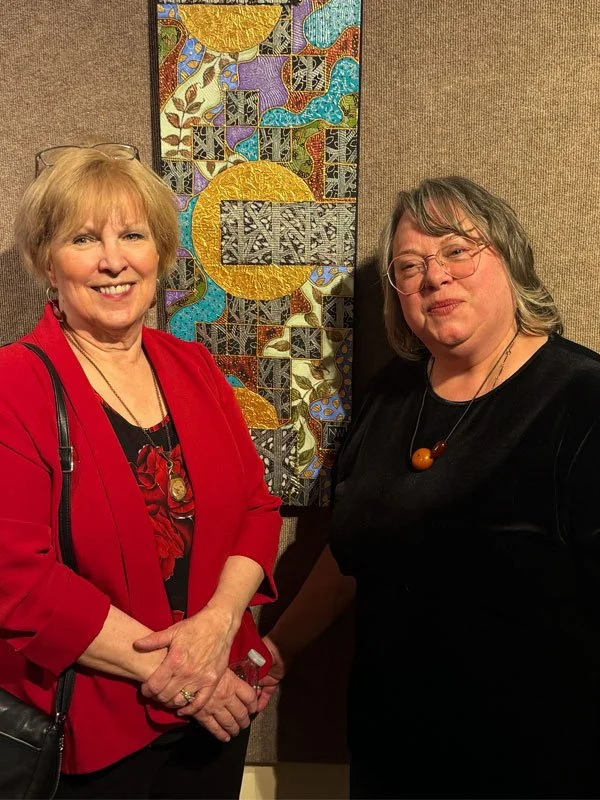 Yours truly with colleague Mary Sunstrom at the 30 Golden Apples exhibit.
