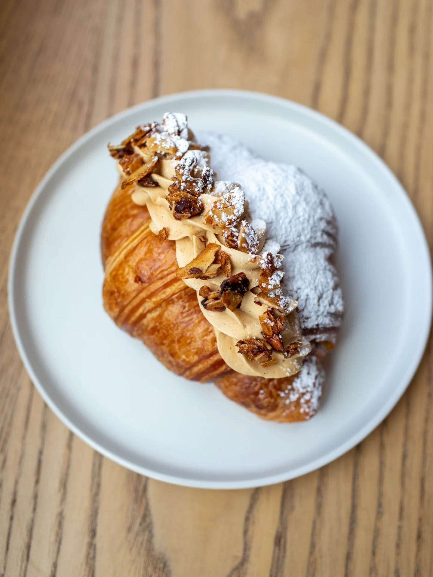 Praline Croissant

Gianduja cream &amp; praline mousse topped with salted candied almonds.

Come by this weekend and grab yours!