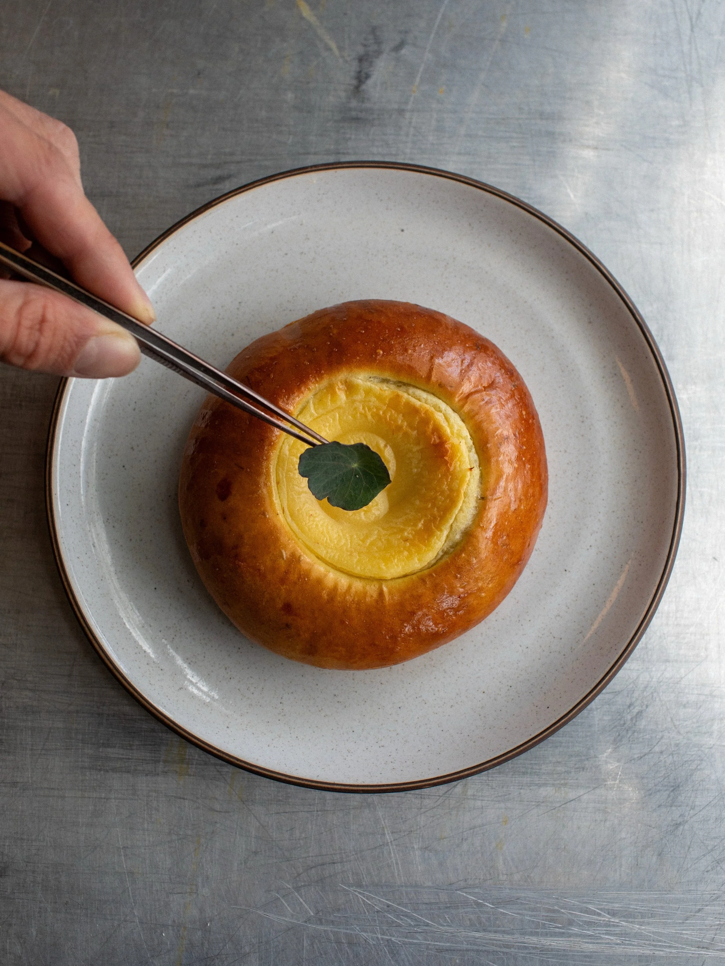 New pastry available today: 

Ramp brioche with D&eacute;lice de Bourgogne pastry cream and house-made lemon jam.

We fold ramp butter into our brioche dough, paired with rich, savory cheese pastry cream and bright lemon jam. Enjoy it before the seas
