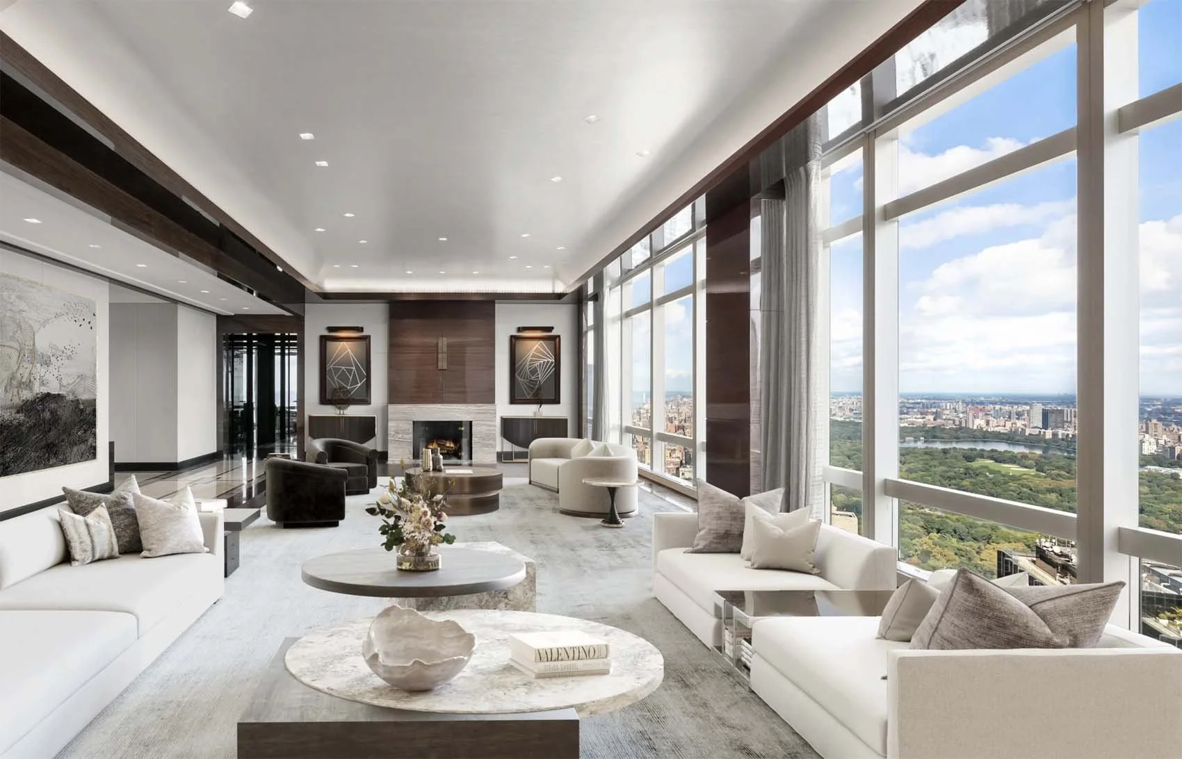 Modern interior living room with large windows showing city and park view, white sofas, black and white armchairs, marble coffee tables, artwork on walls, and a fireplace.