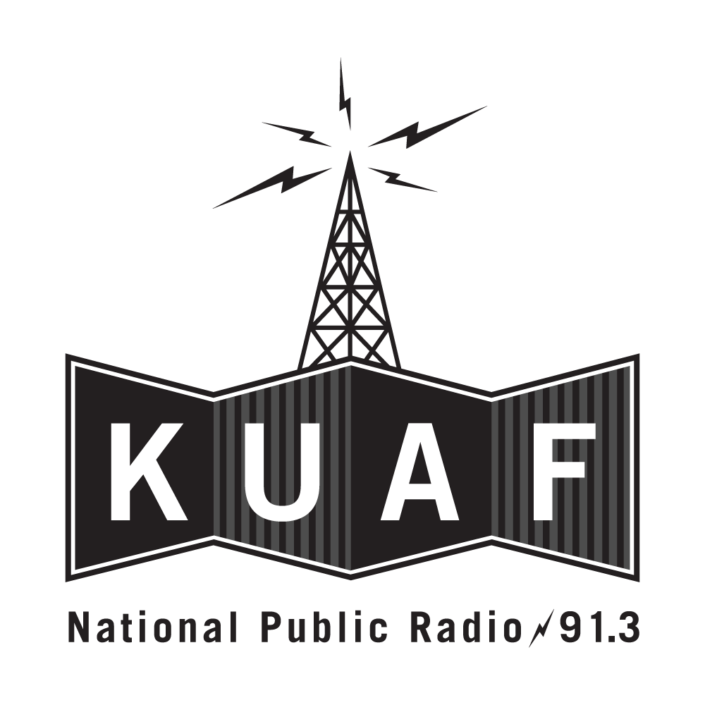 Logo for KUAF, a radio station at 91.3 FM, featuring a radio transmission tower with lightning bolts, and the station's name.
