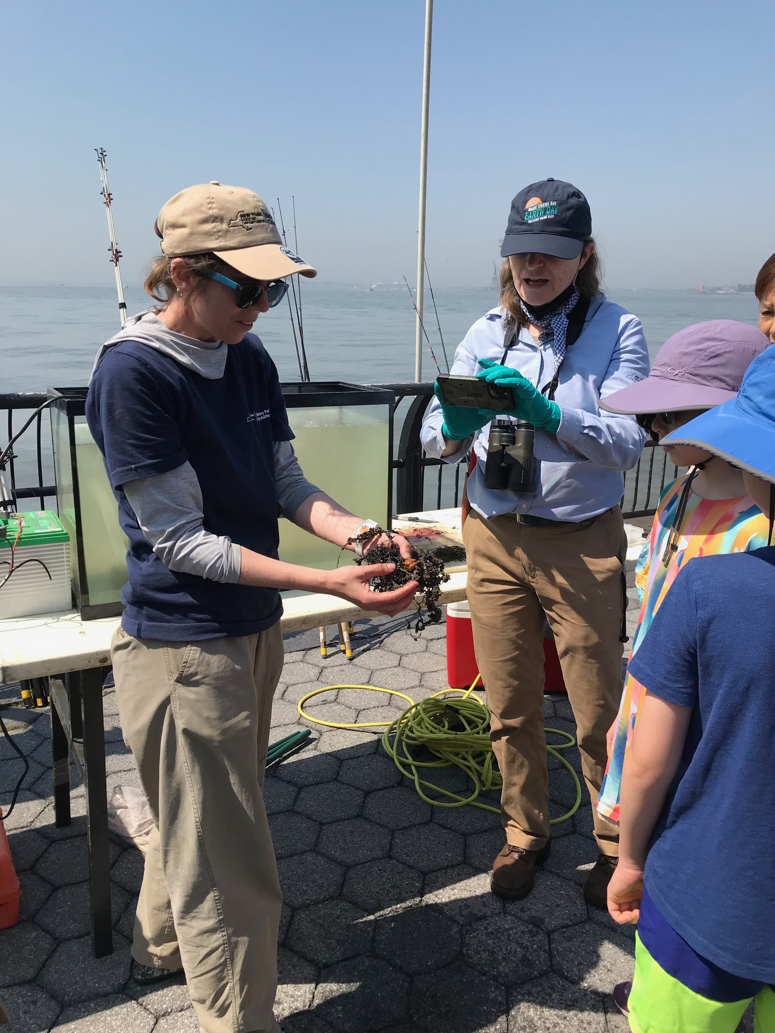 Marieke shows off some tangled line pulled from the river--leave it cleaner than you found it!