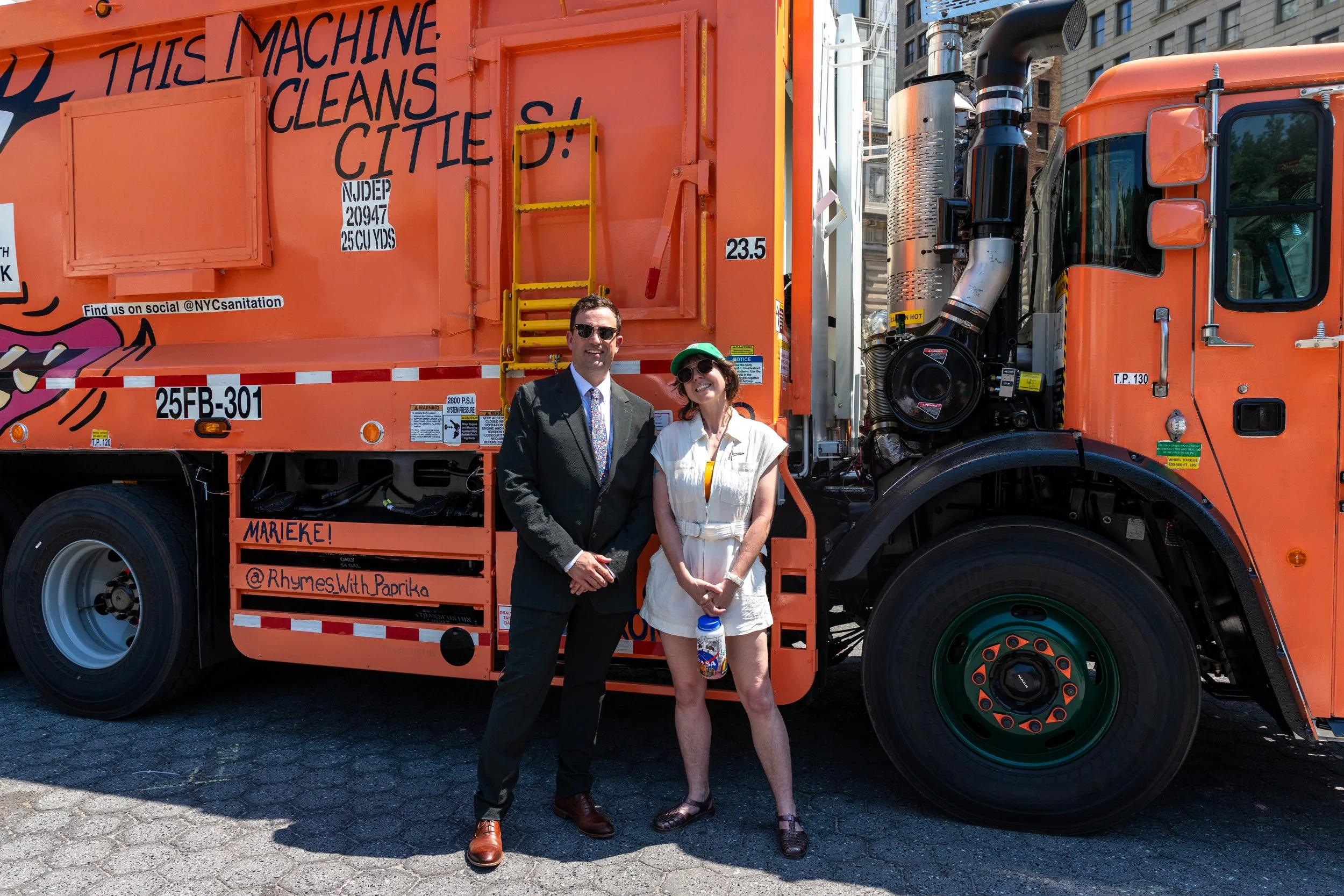 Marieke and Commissioner Greg Anderson at the 2026 Trucks of Art unveiling. 