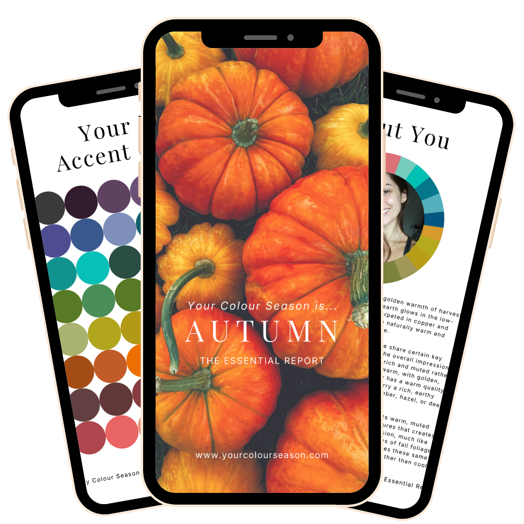 Smartphone displaying a cover image with several orange pumpkins and one yellow pumpkin, representing autumn.