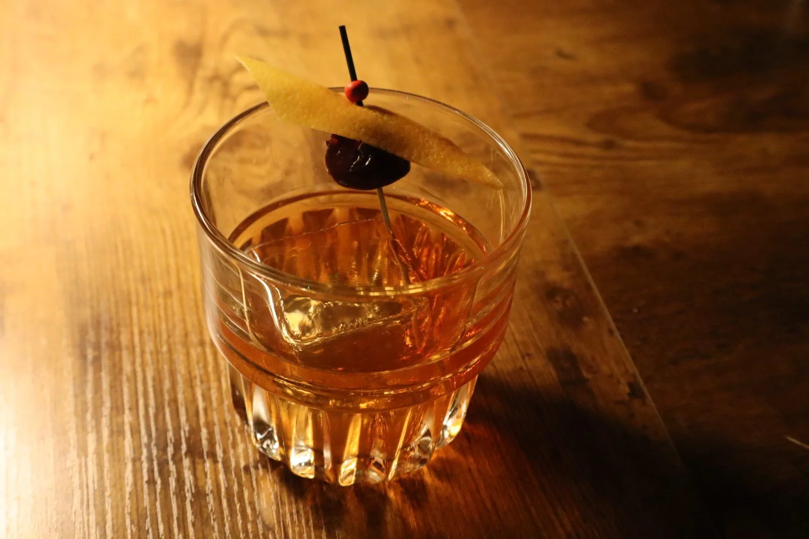 A martini cocktail with olives