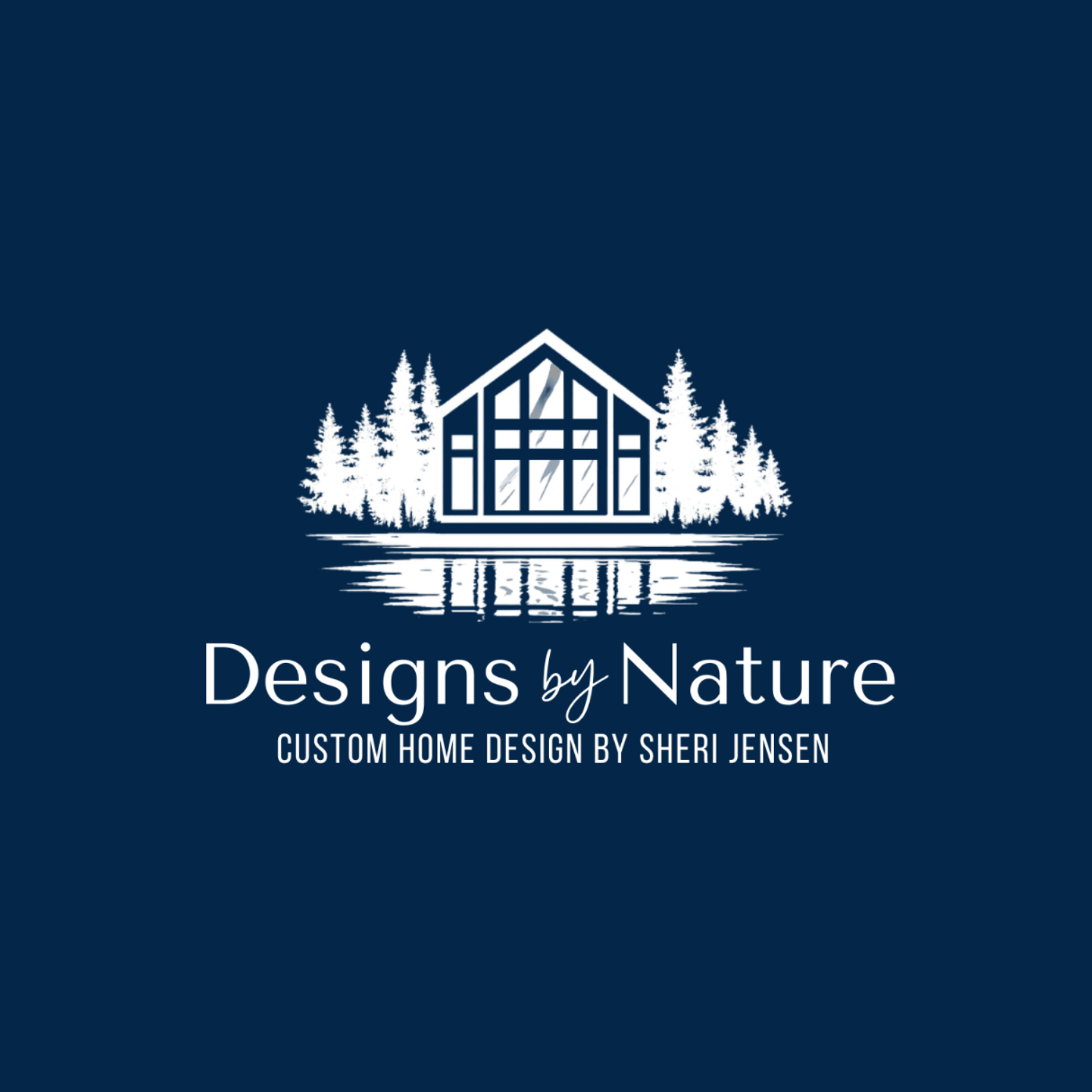 Logo for Designs by Nature featuring a cabin surrounded by trees reflected in water with the text 'Designs by Nature, Custom Home Design by Sheri Jensen'.