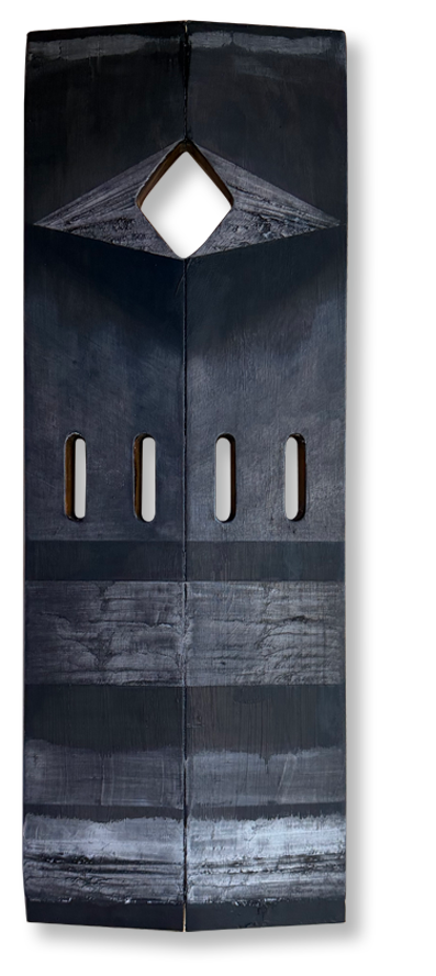 Close-up of the bow of a large ship made of dark metal with a diamond-shaped opening near the top and four vertical slots below it.