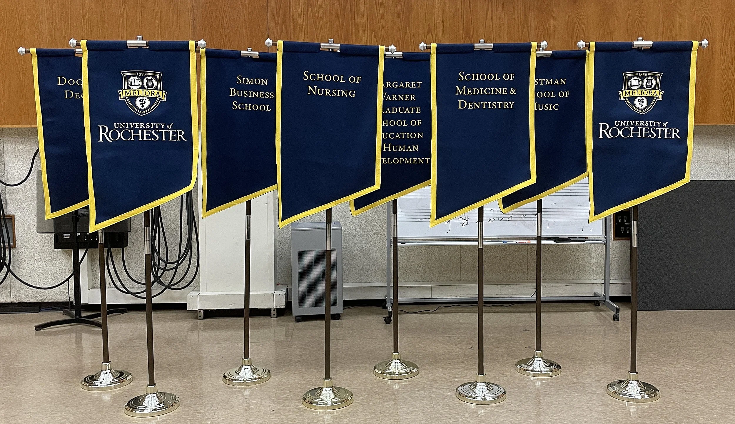 Stock gonfalon-style banners have a pronounced cross shape, making them look medieval or overly-religious. I modified these to a T-shape to make them more unique.
