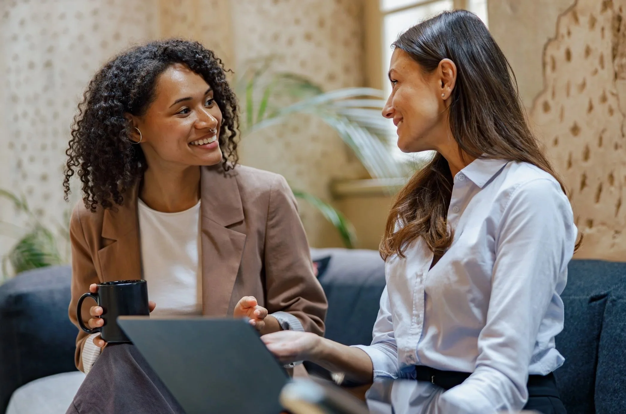 A sales leader coaching a team member one on one