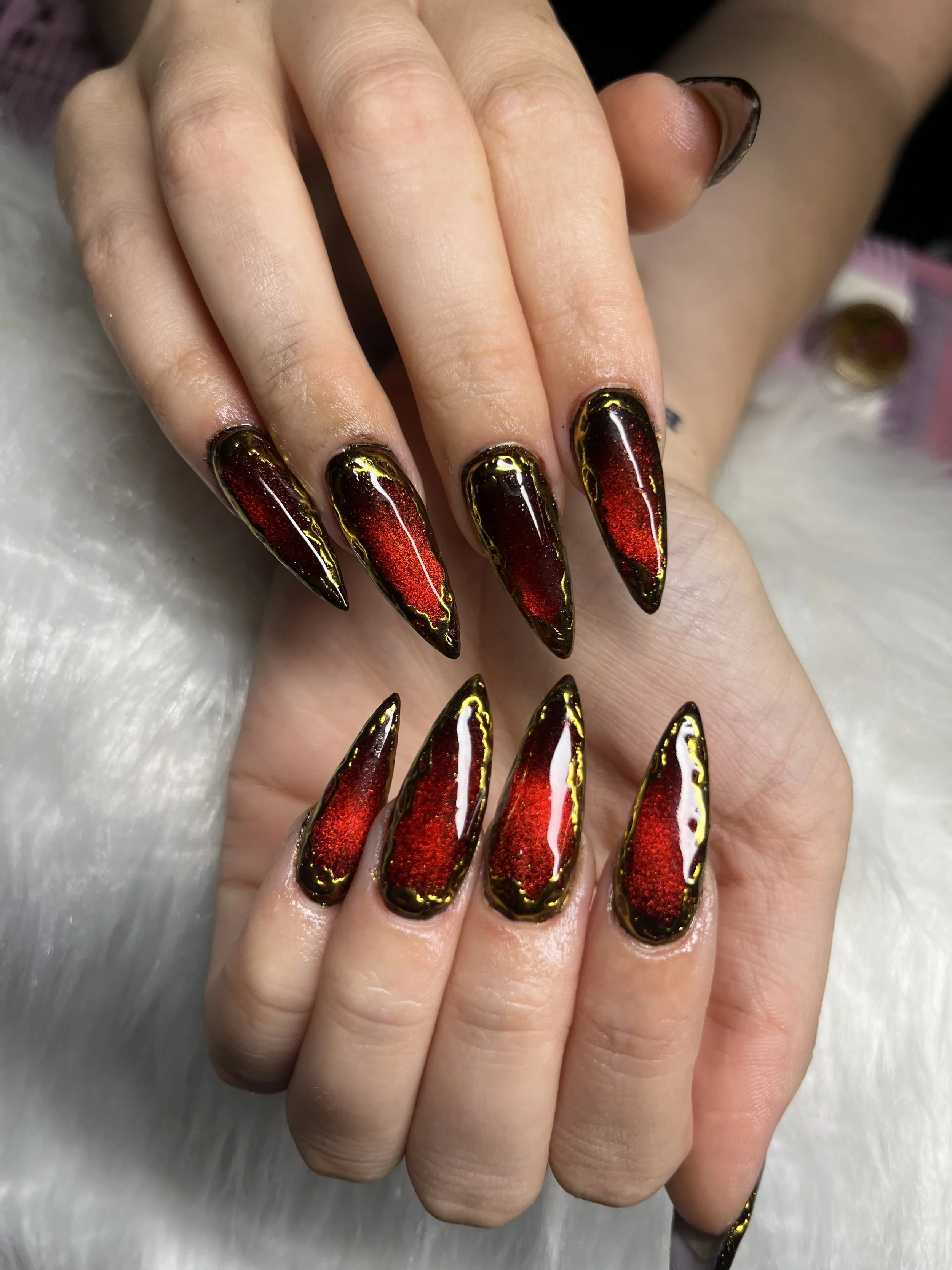 Red cat eye halloween acrylic nails done by private nail tech in Winnetka, SFV
