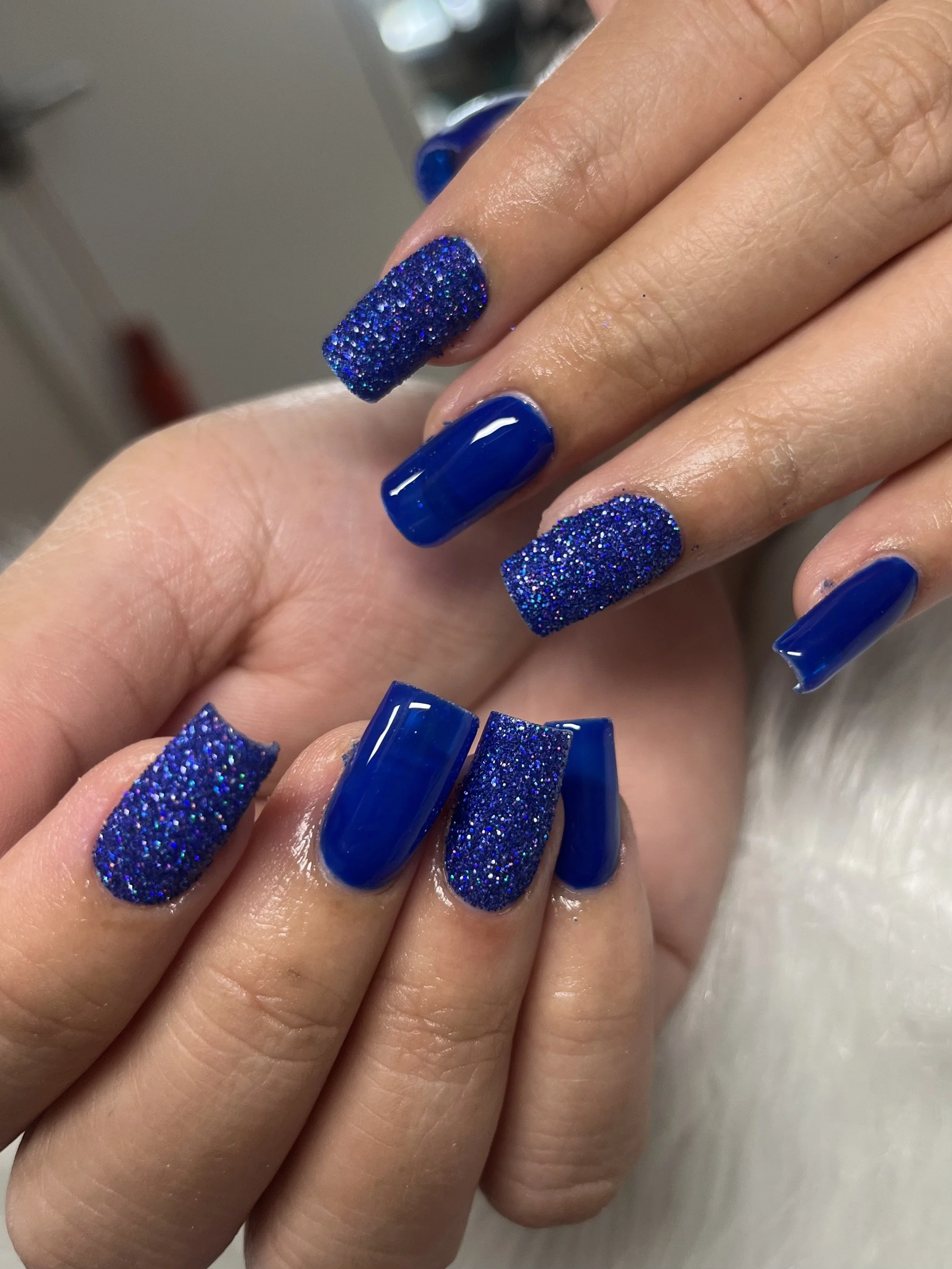 Dark blue glitter nails done by private nail tech in Winnetka, SFV