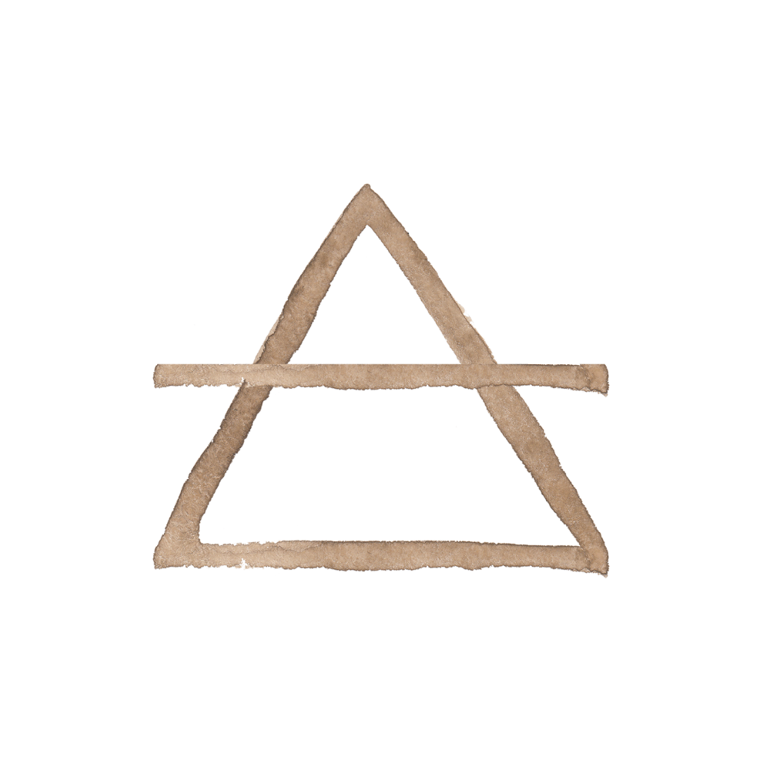 A creative chocolate chip cookie slice themed tree topper shaped like the letter 'A' with a chocolate chip cookie frosting appearance